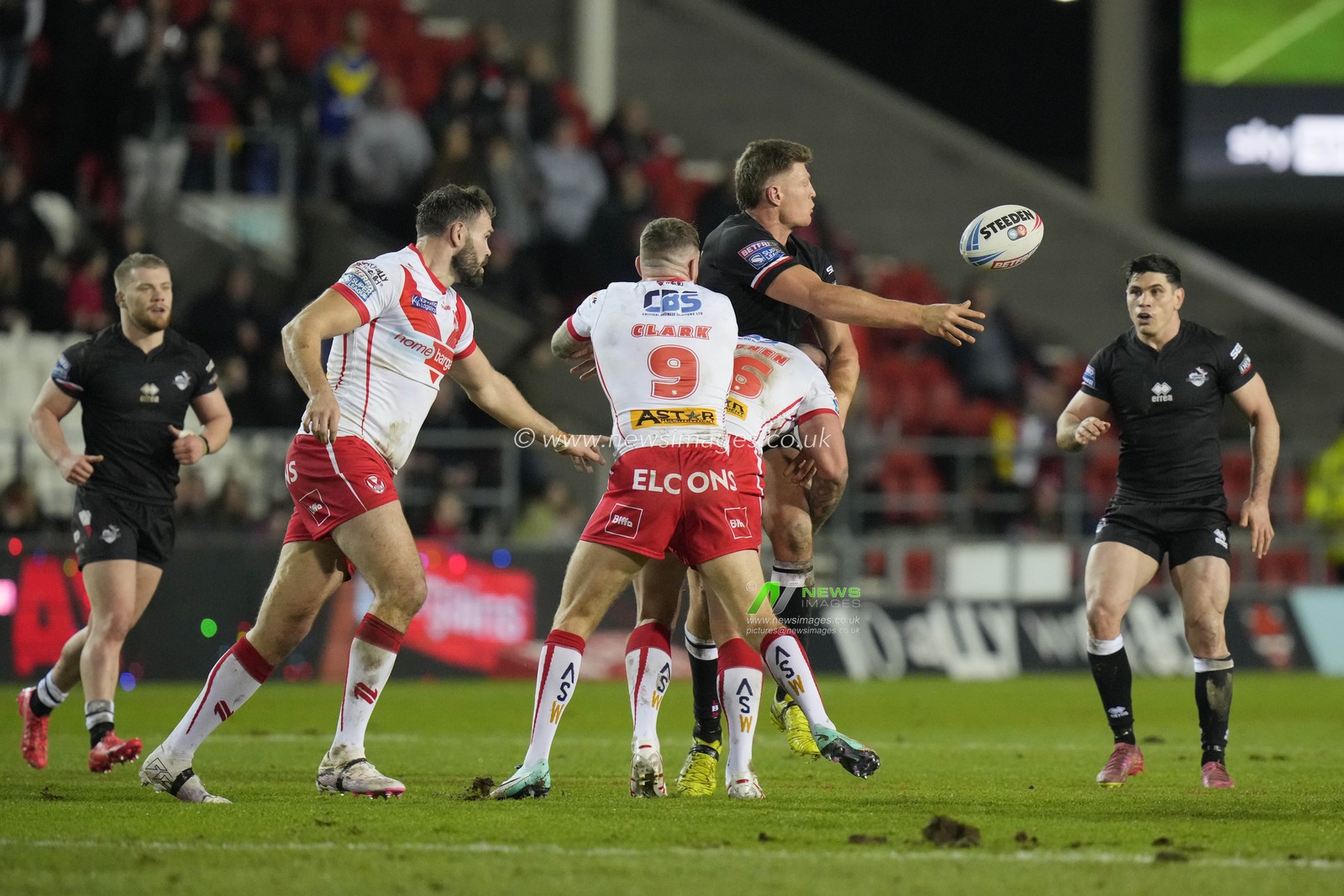 Rhys Kennedy of London Broncos offloads the ball during the Betfred Super League Round 1 match St Helens vs London Broncos at Totally Wicked Stadium, St Helens, United Kingdom, 16th February 2024

(Photo by Steve Flynn/News Images)