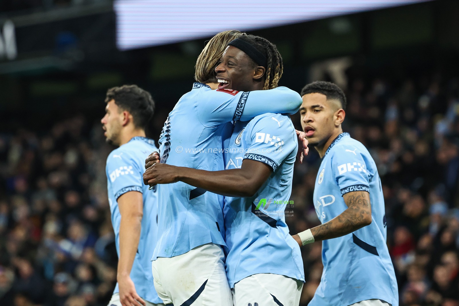 JÃ©rÃ©my Doku of Manchester City celebrates his goal to make it 1-0 during the Emirates FA Cup 3rd Round match Manchester City vs Salford City at Etihad Stadium, Manchester, United Kingdom, 11th January 2025

(Photo by Mark Cosgrove/News Images)
