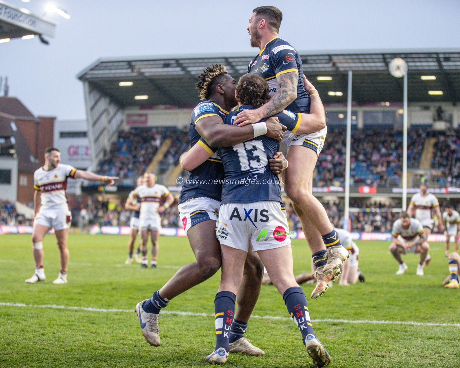 Cameron Smith #13 of Leeds Rhinos celebrates their try with team mates during the Betfred Super League Round 8 match Leeds Rhinos vs Huddersfield Giants at Headingley Stadium, Leeds, United Kingdom, 9th April 2023

(Photo by Mark Cosgrove/News Images)
