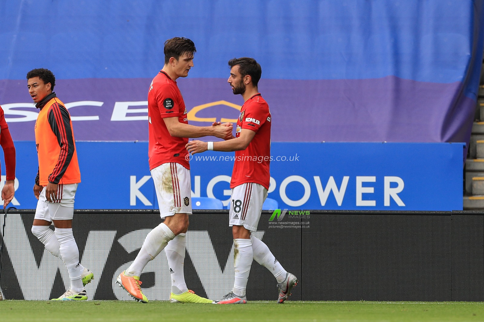 Bruno Fernandes (18) of Manchester United celebrates his goal with Harry Maguire (5) of Manchester United  after scoring a penalty yo make it 0-1