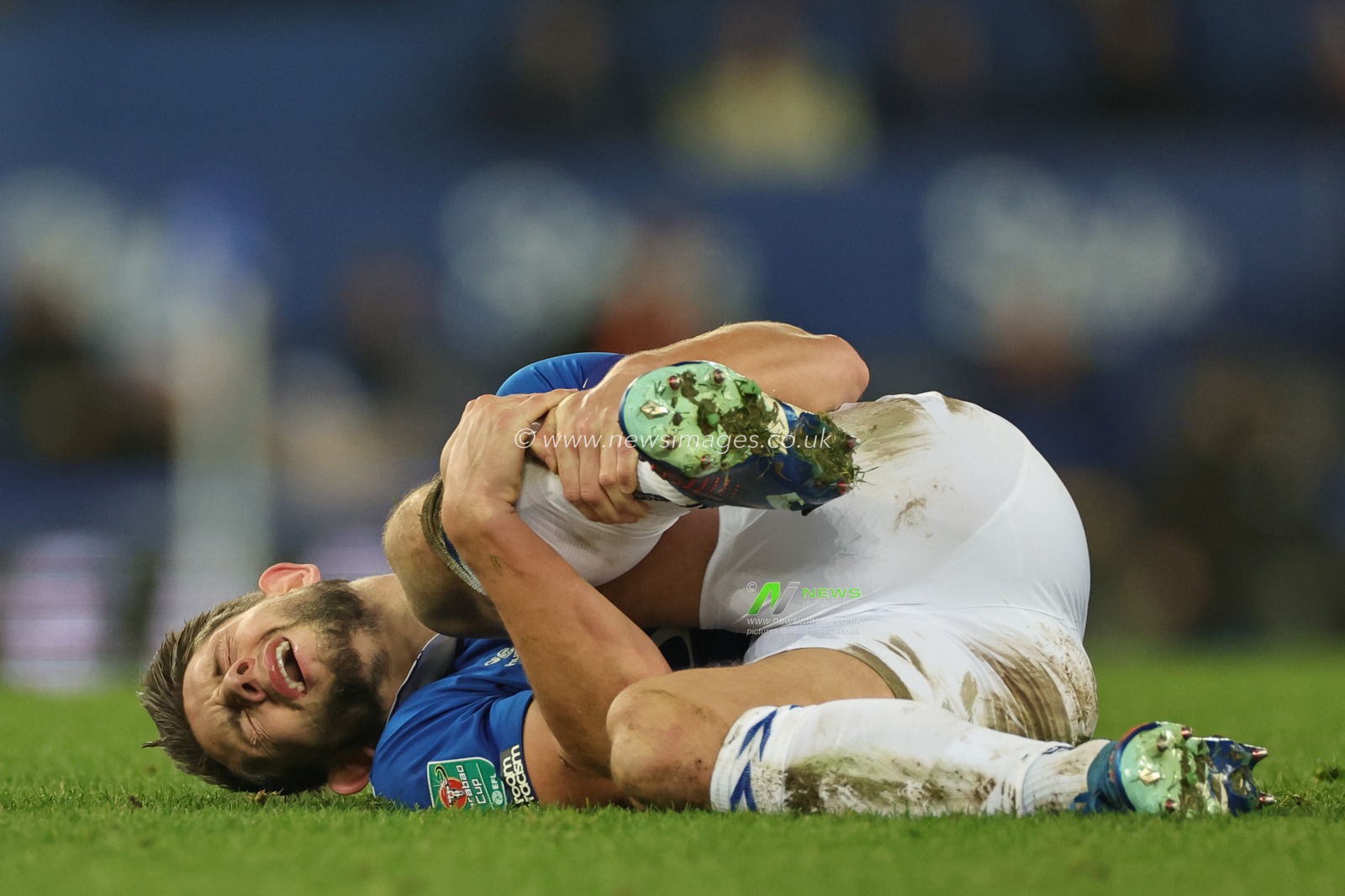 James Tarkowski of Everton goes down injured during the Carabao Cup Quarter Final match Everton vs Fulham at Goodison Park, Liverpool, United Kingdom, 19th December 2023

(Photo by Mark Cosgrove/News Images)