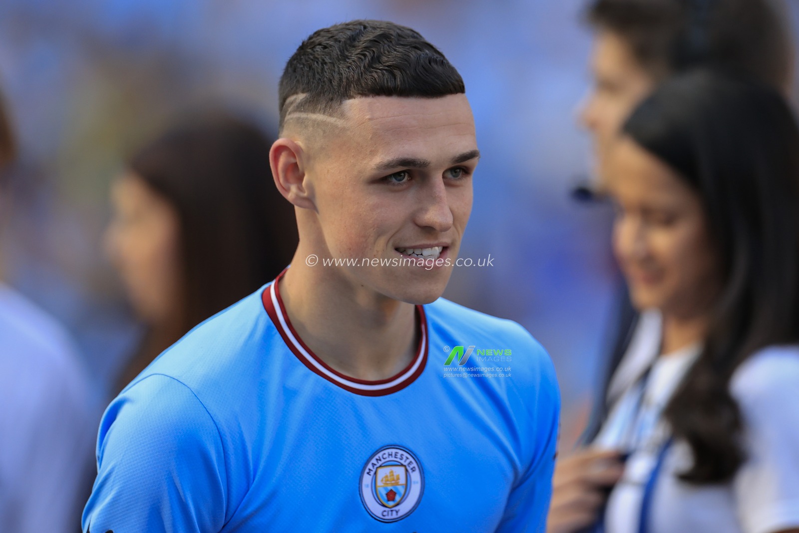 Phil Foden #47 of Manchester City walks to the presentation podium after the Premier League match Manchester City vs Chelsea at Etihad Stadium, Manchester, United Kingdom, 21st May 2023

(Photo by Conor Molloy/News Images)