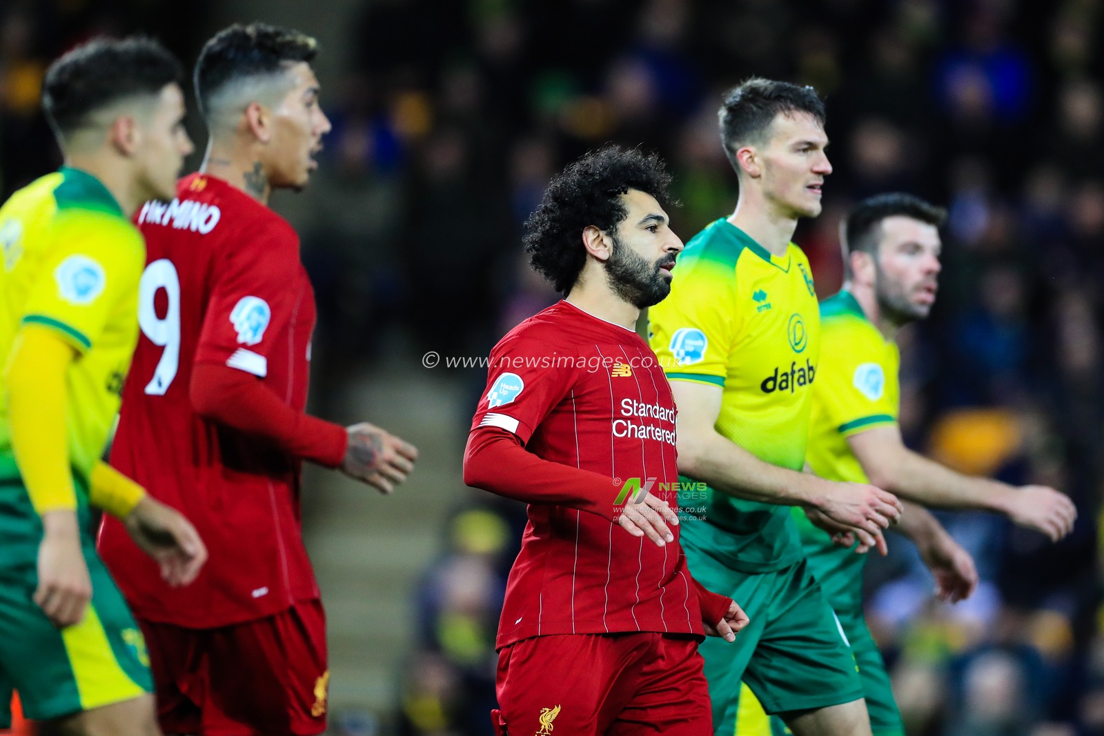 15th February 2020, Carrow Road, Norwich, England; Premier League, Norwich City v Liverpool : Mohamed Salah (11) of Liverpool tries to find some space amongst the Norwich defence