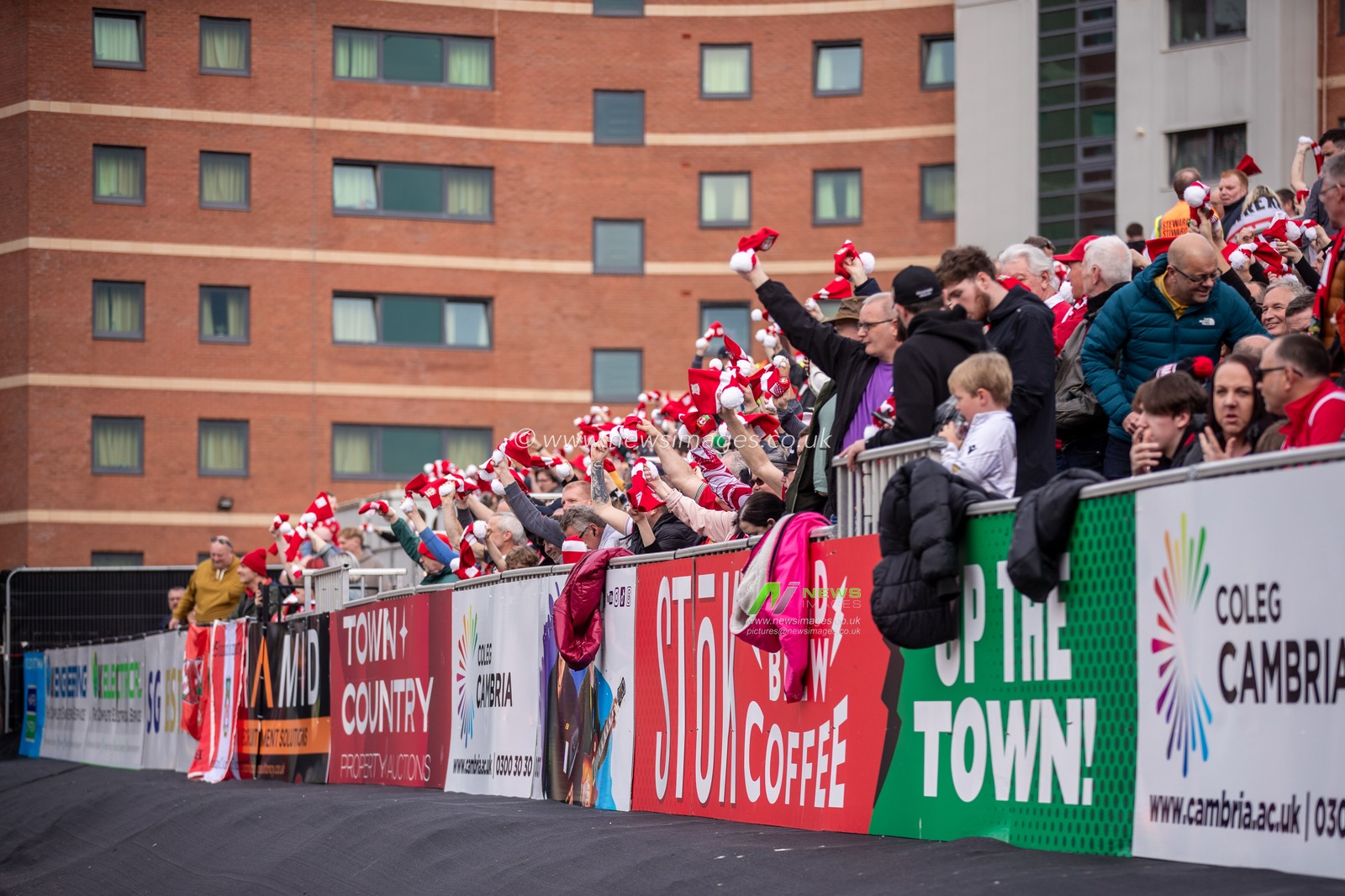 Wrexham fans during the Sky Bet League 1 match Wrexham vs Stockport County at SToK Cae Ras, Wrexham, United Kingdom, 22nd March 2025

(Photo by Nik Mesney/News Images)