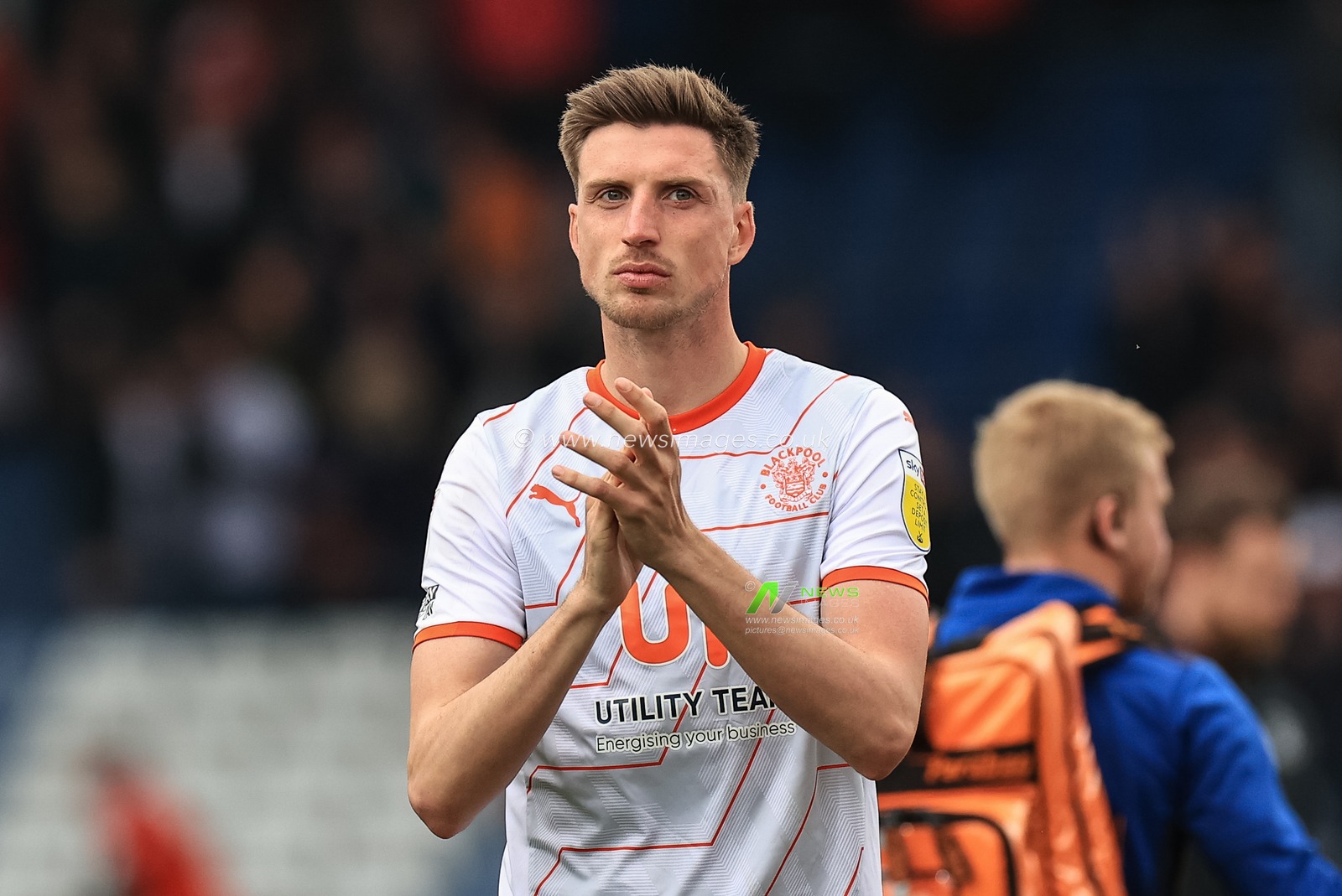 Jake Beesley #28 of Blackpool applauds the traveling fans after Blackpool draw 1-1