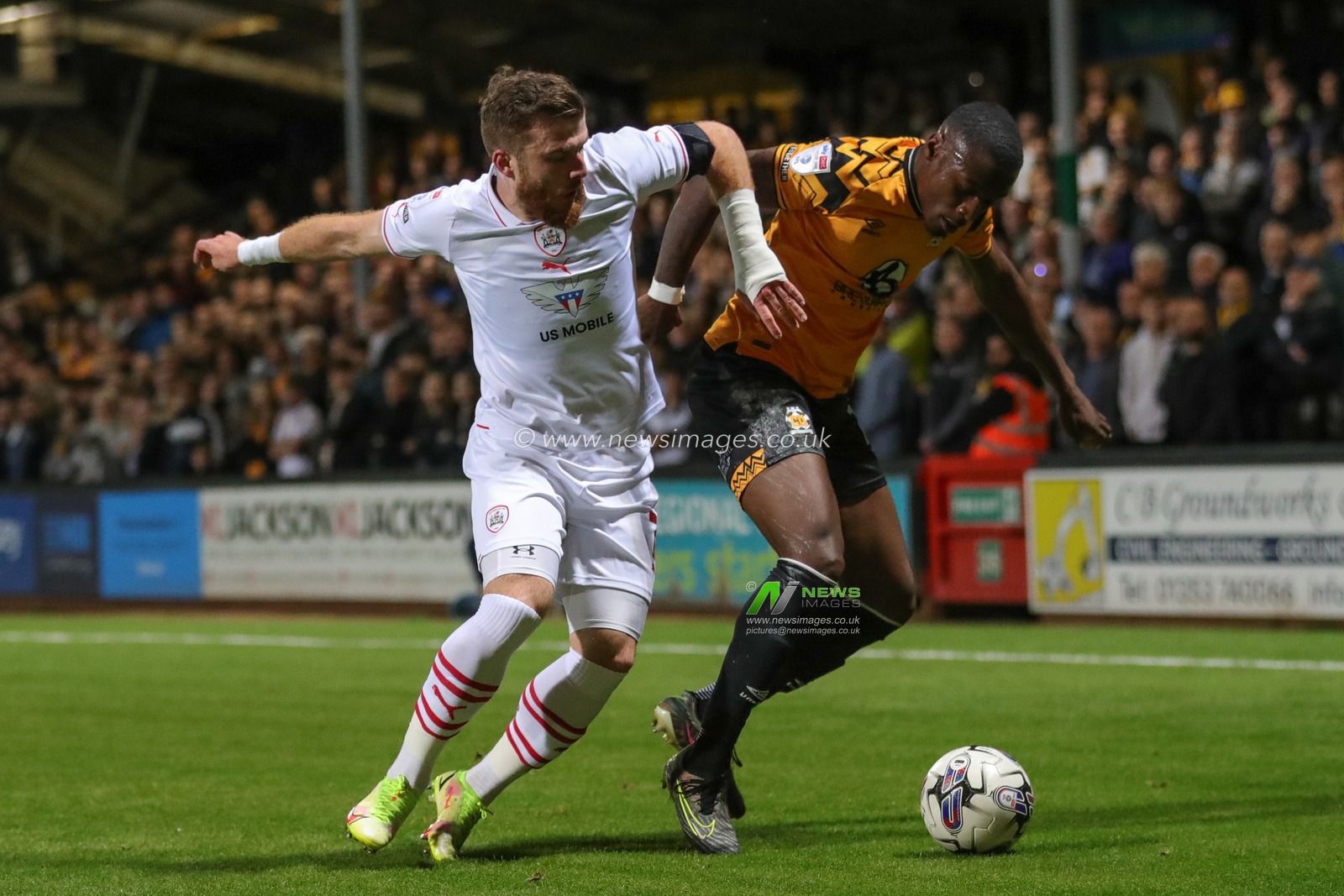 Nicky Cadden #7 of Barnsley and Jubril Okedina #15 of Cambridge United battle for the ball during the Sky Bet League 1 match Cambridge United vs Barnsley at Abbey Stadium, Cambridge, United Kingdom, 3rd October 2023

(Photo by Alfie Cosgrove/News Images)