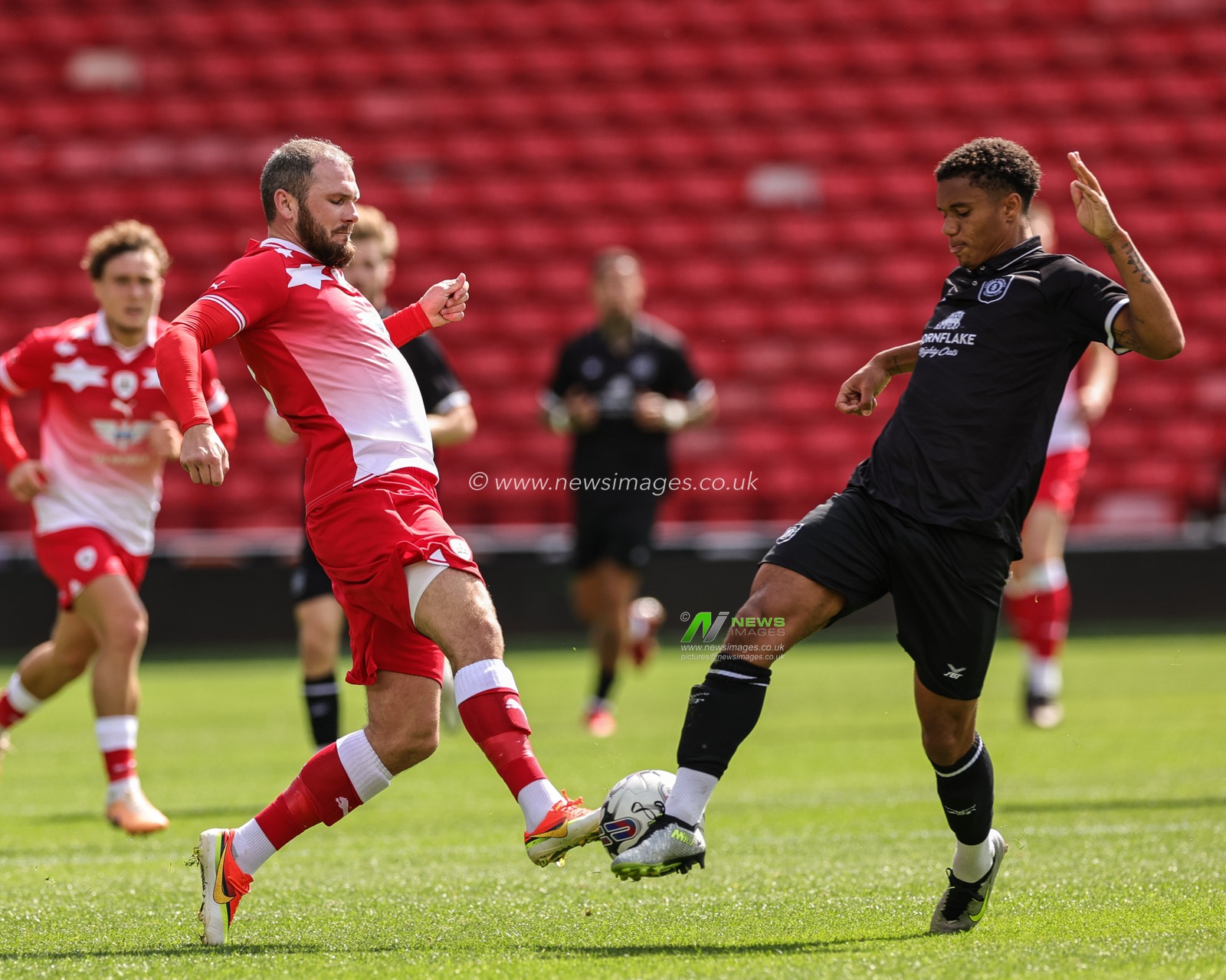 James Norwood #9 of Barnsley in action during the Pre-season friendly match Barnsley vs Crewe Alexandra at Oakwell, Barnsley, United Kingdom, 29th July 2023

(Photo by Mark Cosgrove/News Images)