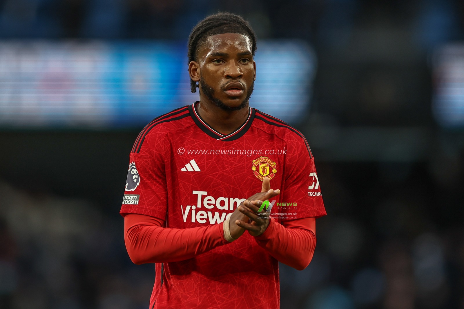 Willy Kambwala of Manchester United applauds the travelling fans during the Premier League match Manchester City vs Manchester United at Etihad Stadium, Manchester, United Kingdom, 3rd March 2024

(Photo by Mark Cosgrove/News Images)