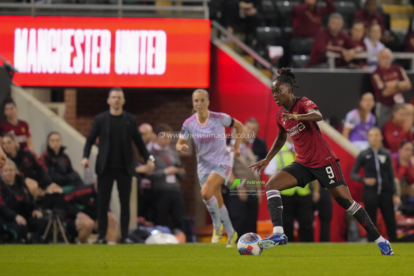 Melvine Malard #9 of Manchester United makes a break during the The FA Women's Super League match Manchester United Women vs Arsenal Women at Leigh Sports Village, Leigh, United Kingdom, 6th October 2023

(Photo by Steve Flynn/News Images)