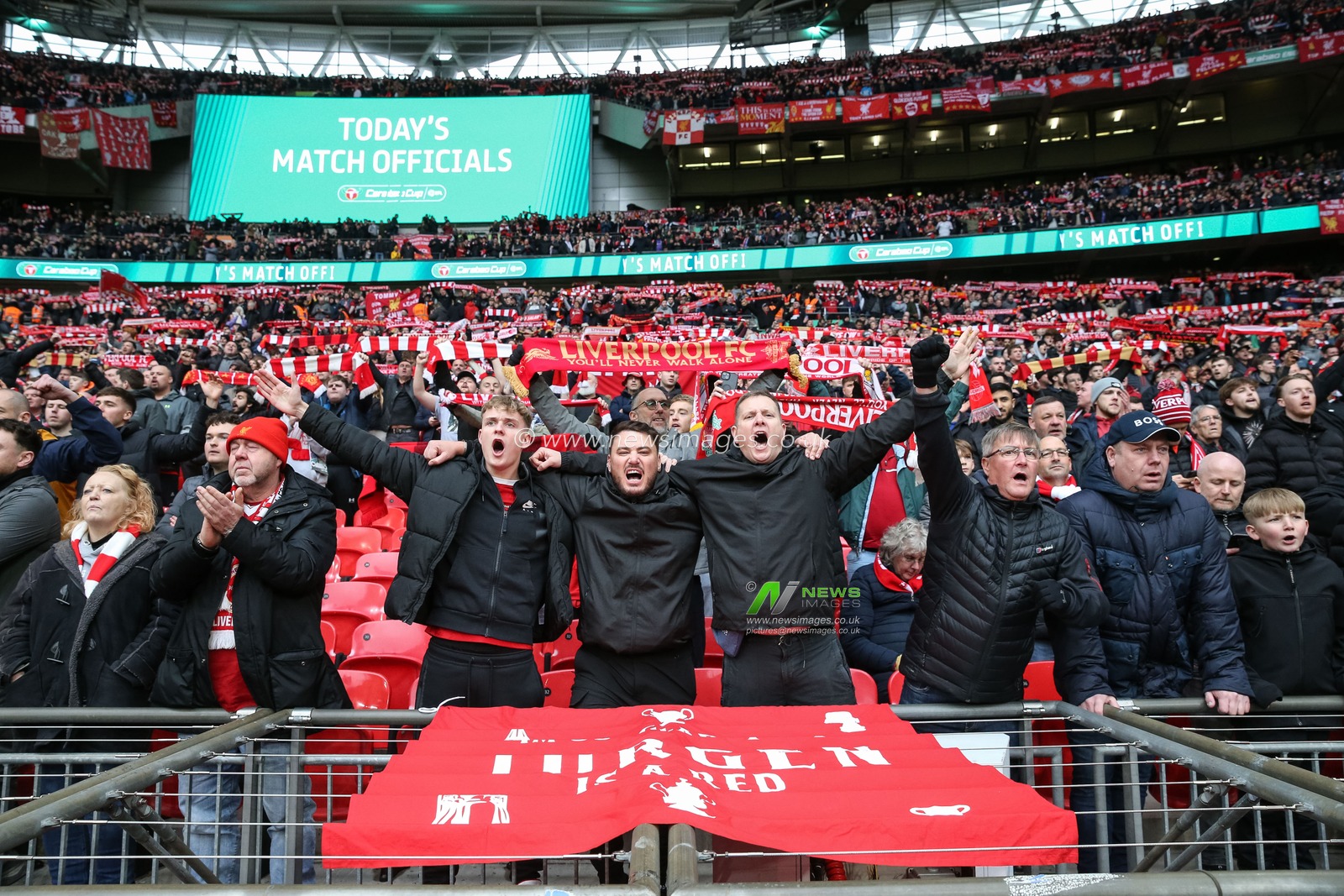 Liverpool fans sing You'll Never Walk Alone as they hold their scarfs above their heads during the Carabao Cup Final match Chelsea vs Liverpool at Wembley Stadium, London, United Kingdom, 25th February 2024

(Photo by Gareth Evans/News Images)