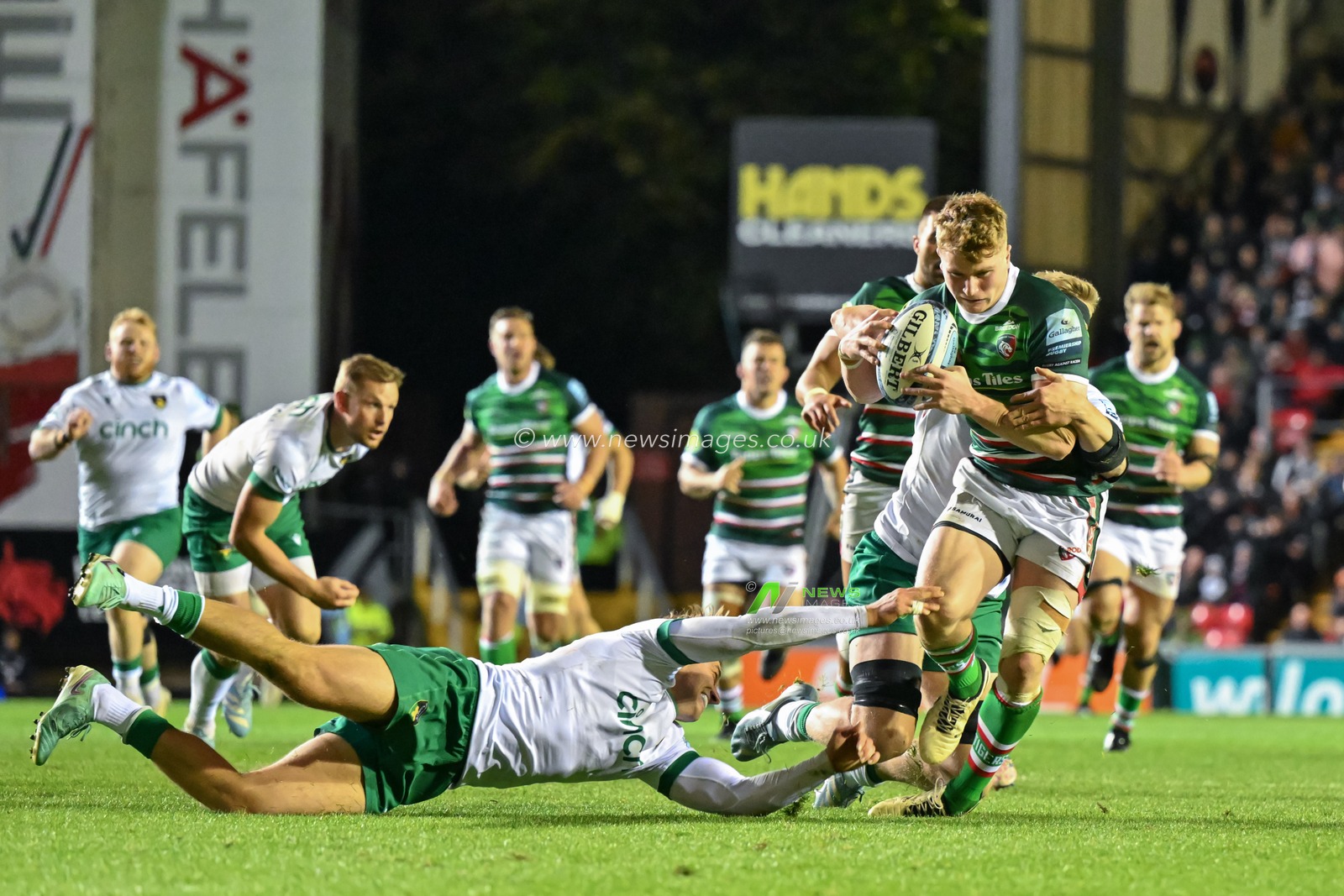 Joseph Woodward of Leicester Tigers gets tackled during the Gallagher Premiership match Leicester Tigers vs Northampton Saints at Mattioli Woods Welford Road Stadium, Leicester, United Kingdom, 12th October 2024

(Photo by Cody Froggatt/News Images)