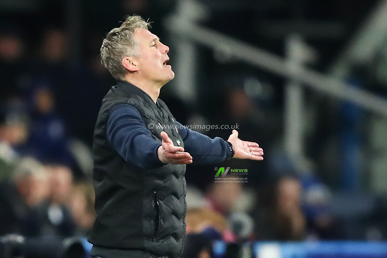 Phil Parkinson manager of Wrexham reacts during the Sky Bet League 1 match Huddersfield Town vs Wrexham at John Smith's Stadium, Huddersfield, United Kingdom, 4th March 2025

(Photo by Jorge Horsted/News Images)