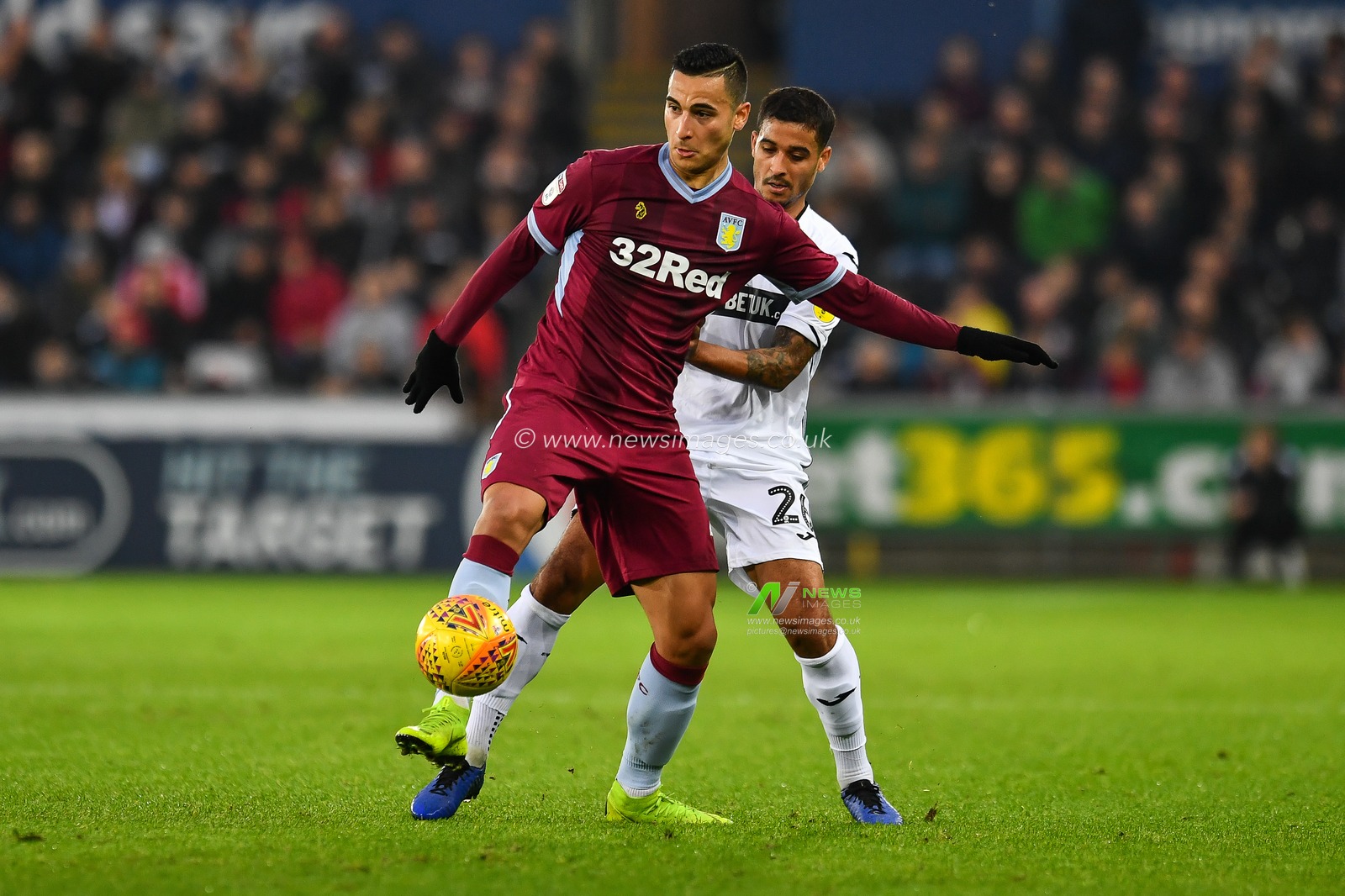26th December 2018, Liberty Stadium, Swansea, Wales; Sky Bet Championship, Swansea vs  Aston Villa ; Anwar El Ghazi of Aston Villa holds off Kyle Naughton of Swansea City  

Credit: Craig Thomas/News Images

English Football League images are subject to DataCo Licence