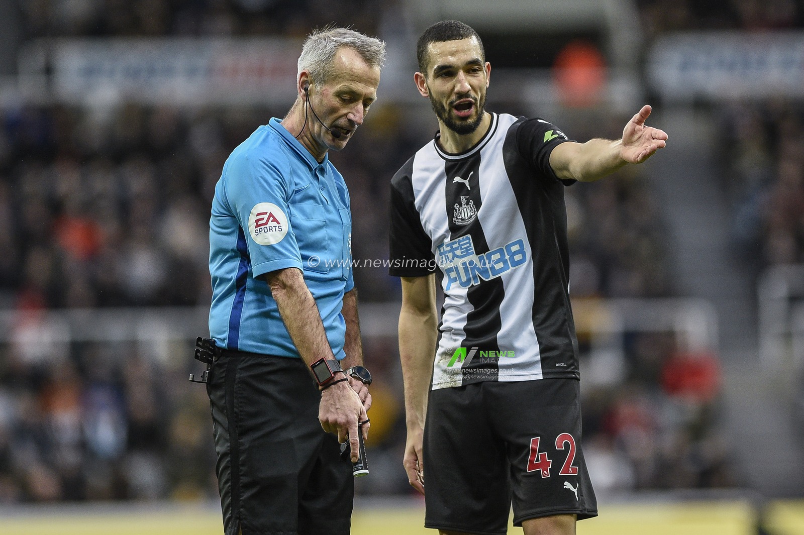 1st February 2020, St. James's Park, Newcastle, England; Premier League, Newcastle United v Norwich City : Nabil Bentaleb (42) of Newcastle United in discussion with referee Martin Atkinson
