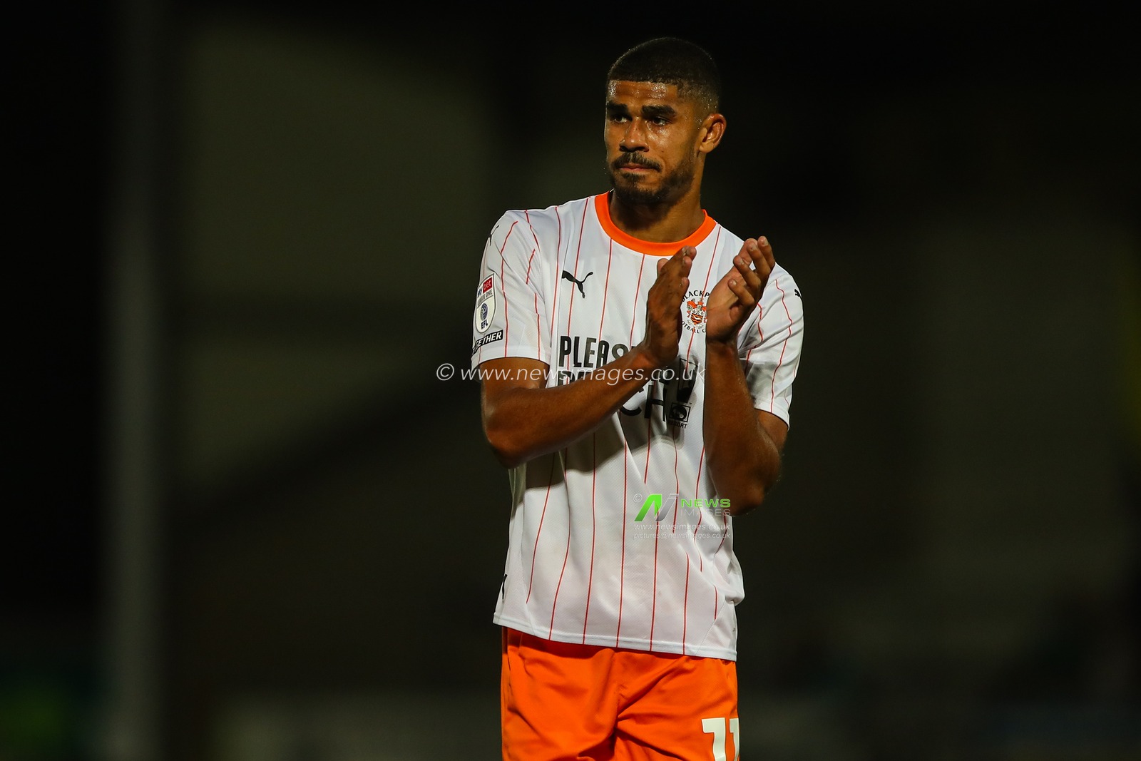 Ashley Fletcher of Blackpool applauds the travelling fans after the Carabao Cup match Burton Albion vs Blackpool at Pirelli Stadium, Burton upon Trent, United Kingdom, 13th August 2024

(Photo by Gareth Evans/News Images)