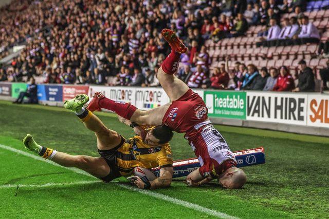 Liam Marshall of Wigan Warriors goes over for a try to make it 22-0 during the Betfred Super League Round 26 match Wigan Warriors vs Castleford Tigers at The Brick Community Stadium, Wigan, United Kingdom, 12th September 2025

(Photo by Alfie Cosgrove/News Images)