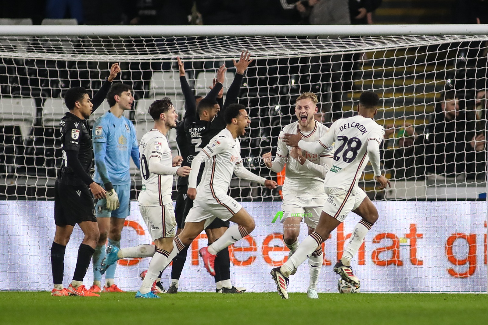 Swansea City players celebrate an equaliser only to be denied by Referee Elliot Bell during the Sky Bet Championship match Swansea City vs Sheffield Wednesday at Swansea.com Stadium, Swansea, United Kingdom, 12th February 2025

(Photo by Andrew Lewis/News Images)