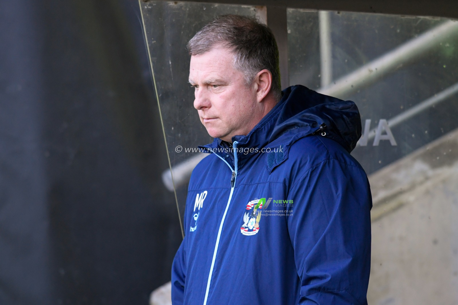 Mark Robins manager of Coventry City looks down at the ground