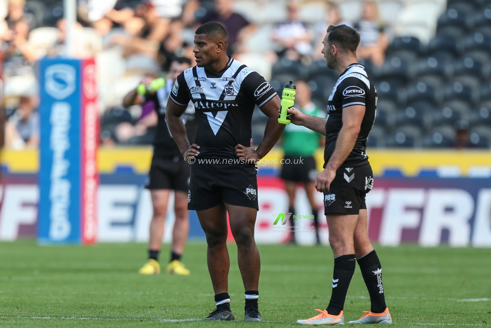 Dejected looking Joe Lovodua #14 of Hull FC with Luke Gale #7 of Hull FC speaking to him