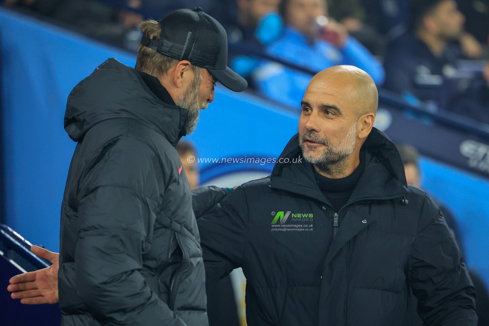 JÃ¼rgen Klopp manager of Liverpool and Pep Guardiola manager of Manchester City embrace during the Carabao Cup Fourth Round match Manchester City vs Liverpool at Etihad Stadium, Manchester, United Kingdom, 22nd December 2022

(Photo by Conor Molloy/News Images)
