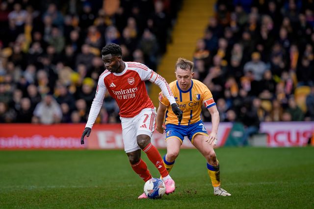 Bukayo Saka of Arsenal dribbles the ball under pressure from Louis Reed of Mansfield Town  during the Emirates FA Cup fifth round match Mansfield Town vs Arsenal at One Call Stadium, Mansfield, United Kingdom on 07 March 2026

(Photo by Maynard Manyowa/News Images)
