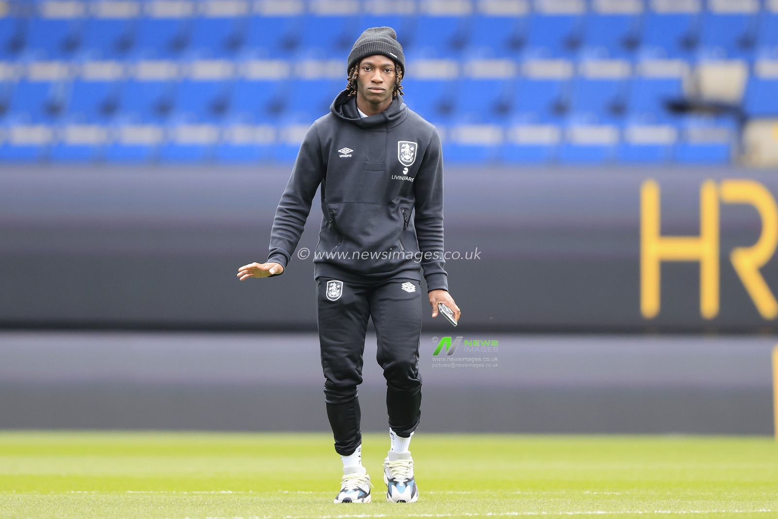 Joseph Hungbo #16 of Huddersfield Town during the pitch inspection ahead of the Sky Bet Championship match Burnley vs Huddersfield Town at Turf Moor, Burnley, United Kingdom, 25th February 2023

(Photo by Conor Molloy/News Images)