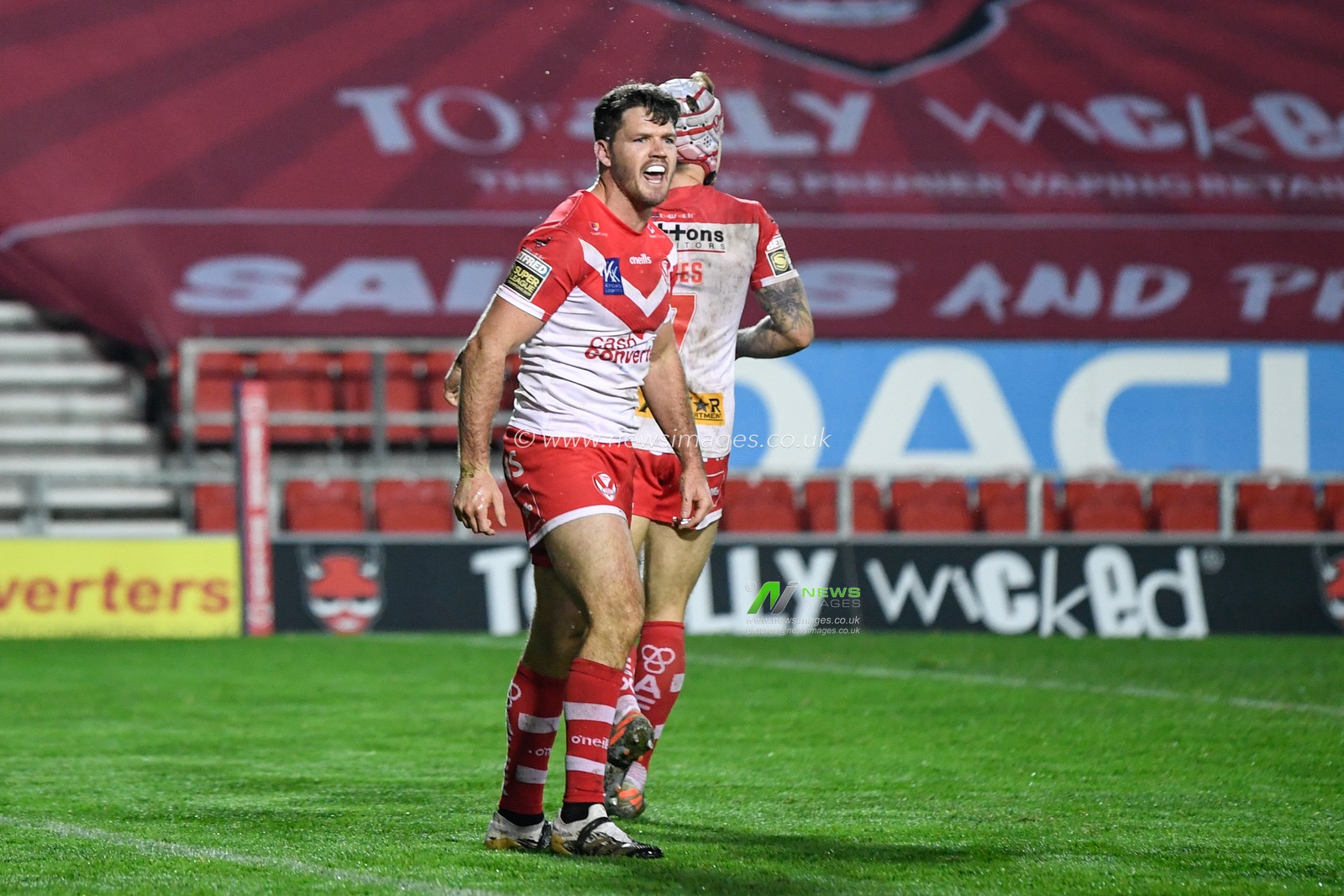 CELEBRATION Lachlan Coote (1) of St Helens celebrates his try making the score 4 - 0