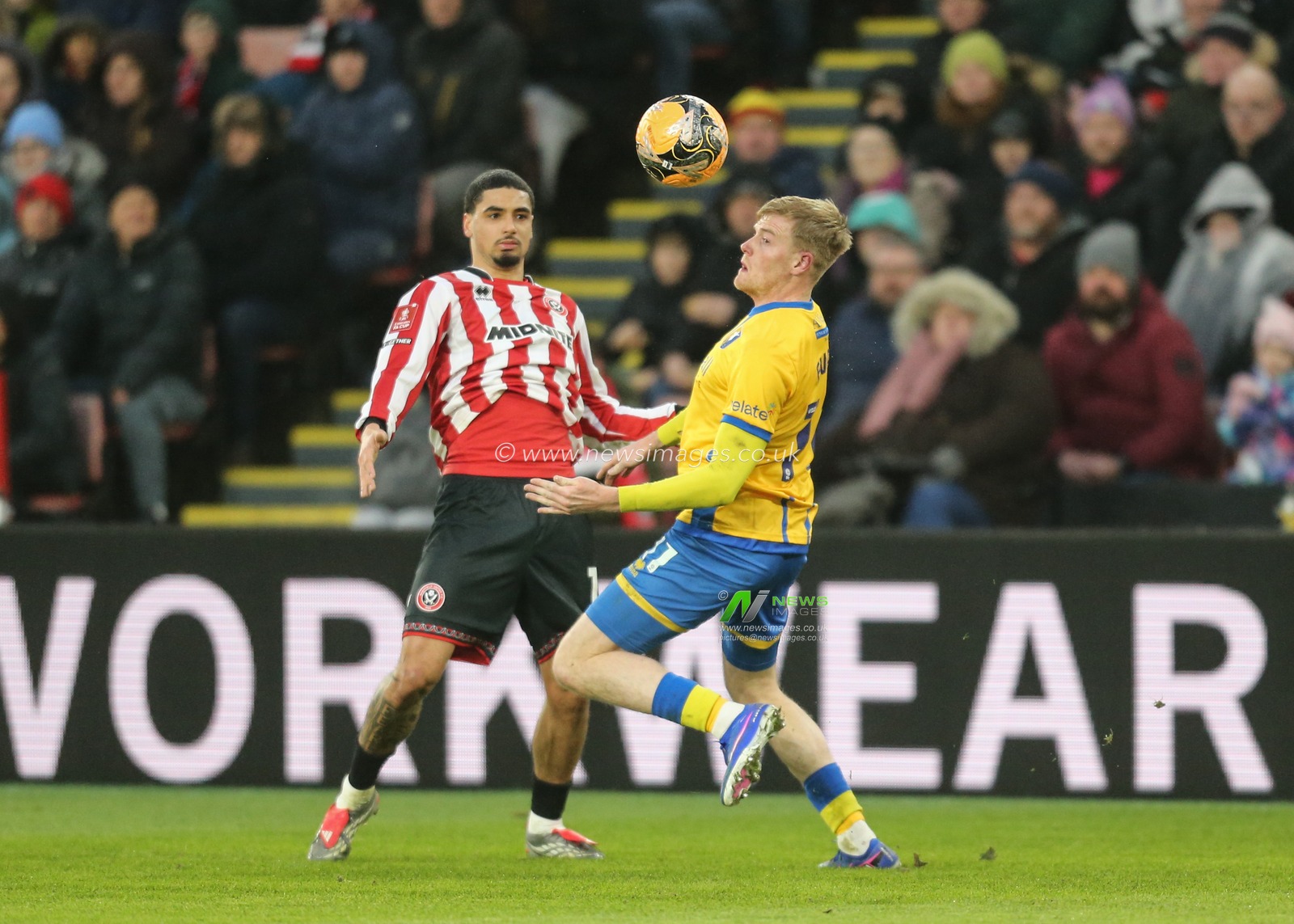 Will Evans of Mansfield Town controls the ball during the Emirates FA Cup Third Round match Sheffield United vs Mansfield Town at Bramall Lane, Sheffield, United Kingdom, 11th January 2026

(Photo by Richard Bierton/News Images)