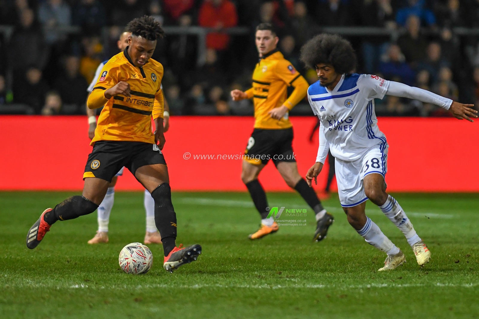 6th January 2019, Rodney Parade, Newport, Wales ; The Emirates FA Cup, 3rd Round, Newport County vs Leicester City : Antoine Semenyo (42) of Newport County takes on Hamza Choudhury (38) of Leicester City 

Credit: Gareth Dalley/News Images

English Football League images are subject to DataCo Licence