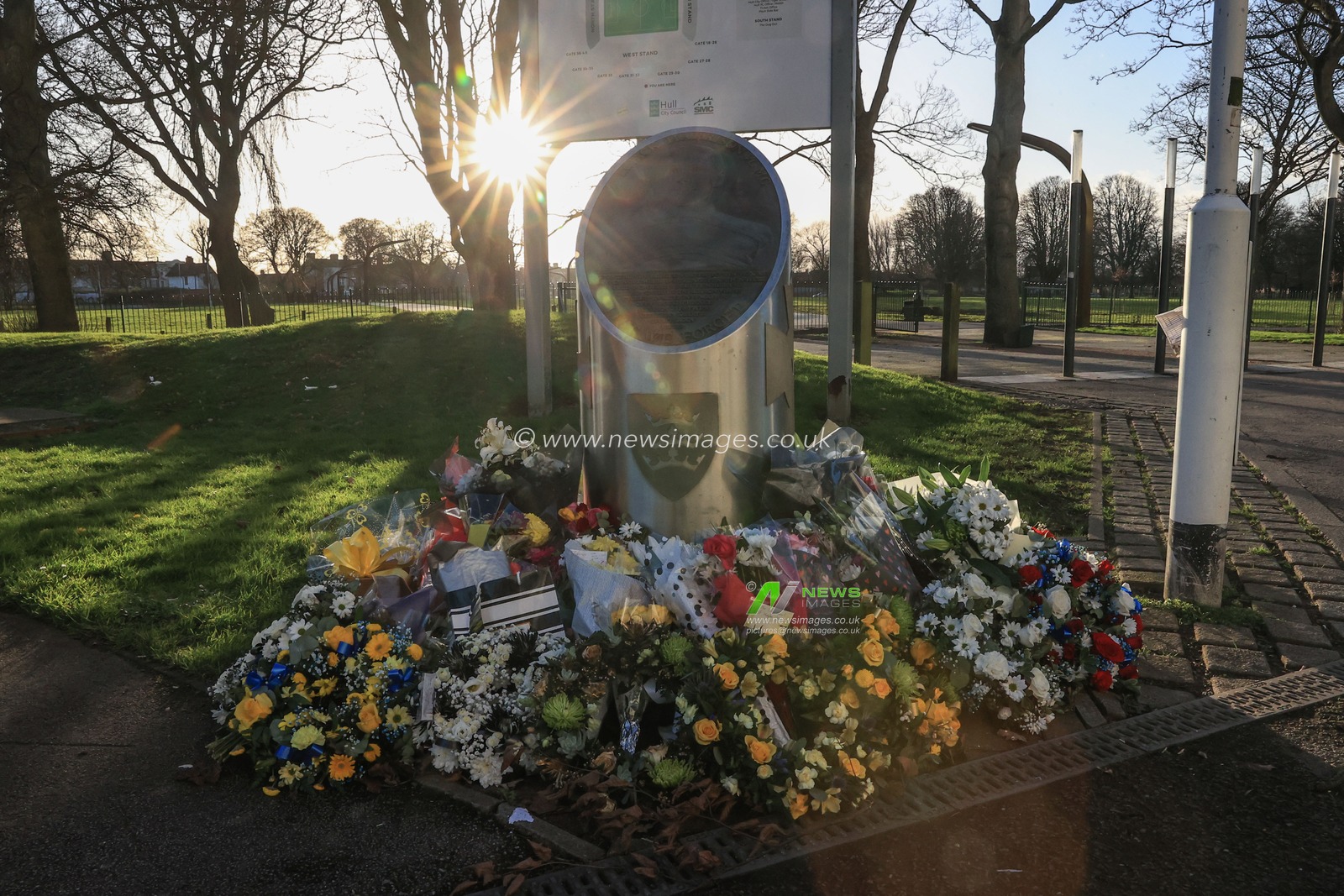 Flowers are laid outside the MKM Stadium