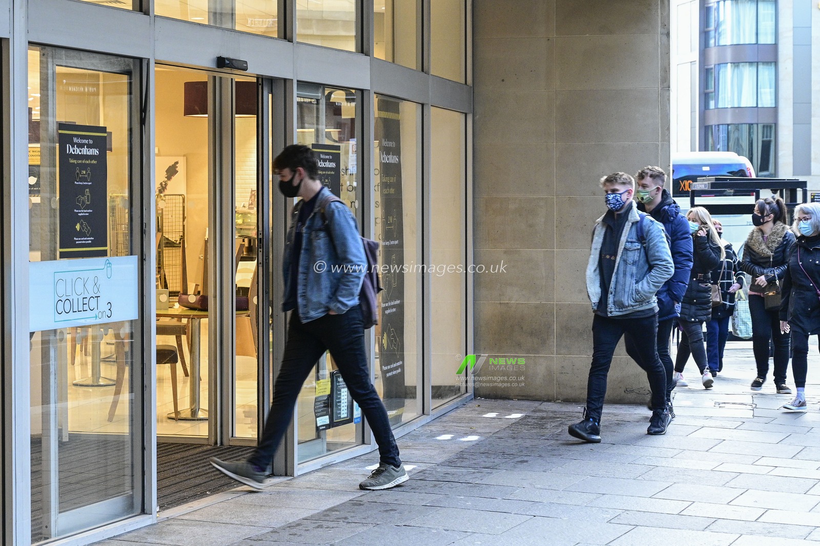 Shoppers enter Debenhams, Newcastle upon Tyne, as stores reopen after the end of the country's second national lockdown