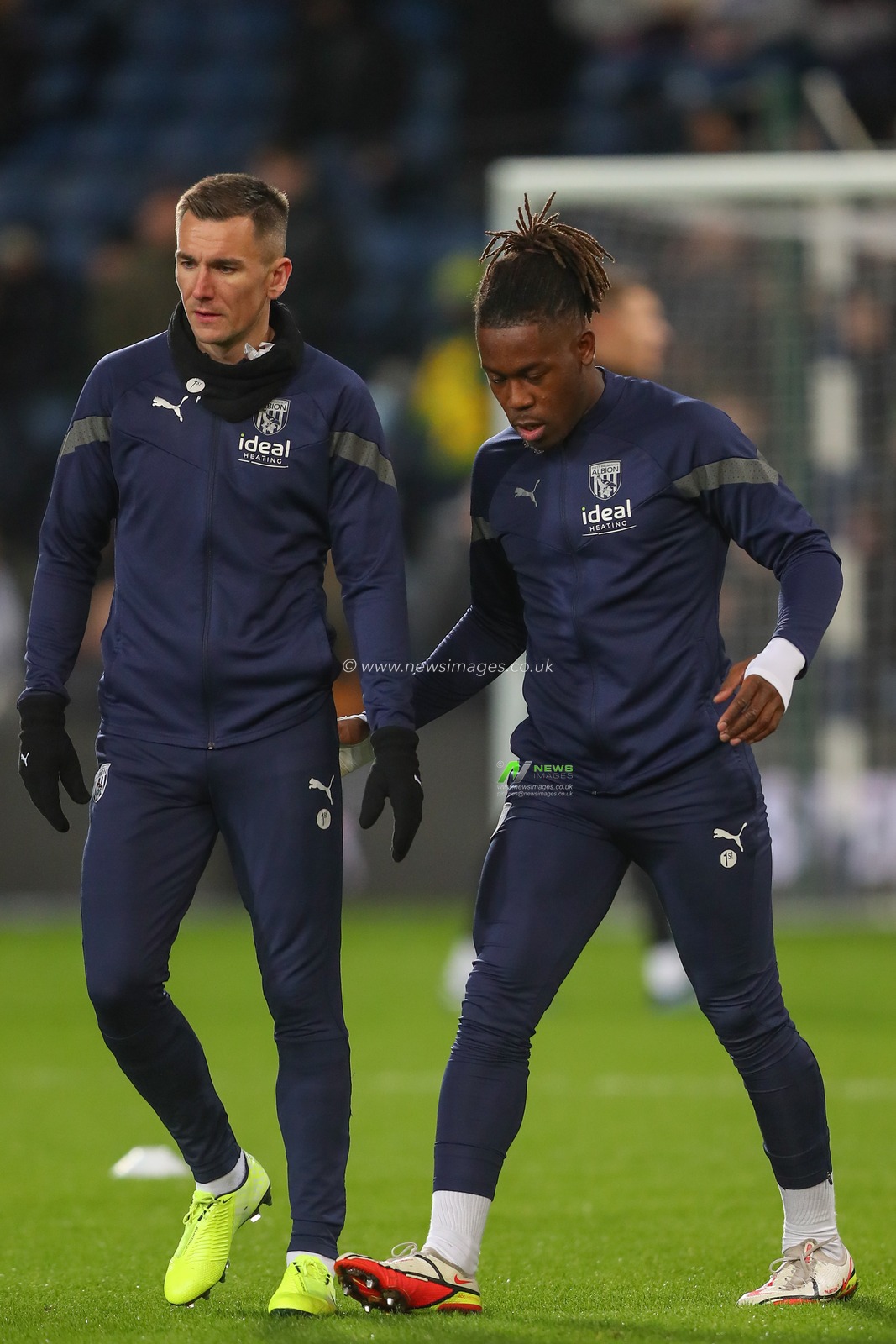 Jed Wallace #17 of West Bromwich Albion and Brandon Thomas-Asante #21 of West Bromwich Albion embrace during the pre-game warm up ahead of the Sky Bet Championship match West Bromwich Albion vs Preston North End at The Hawthorns, West Bromwich, United Kingdom, 29th December 2022

(Photo by Gareth Evans/News Images)