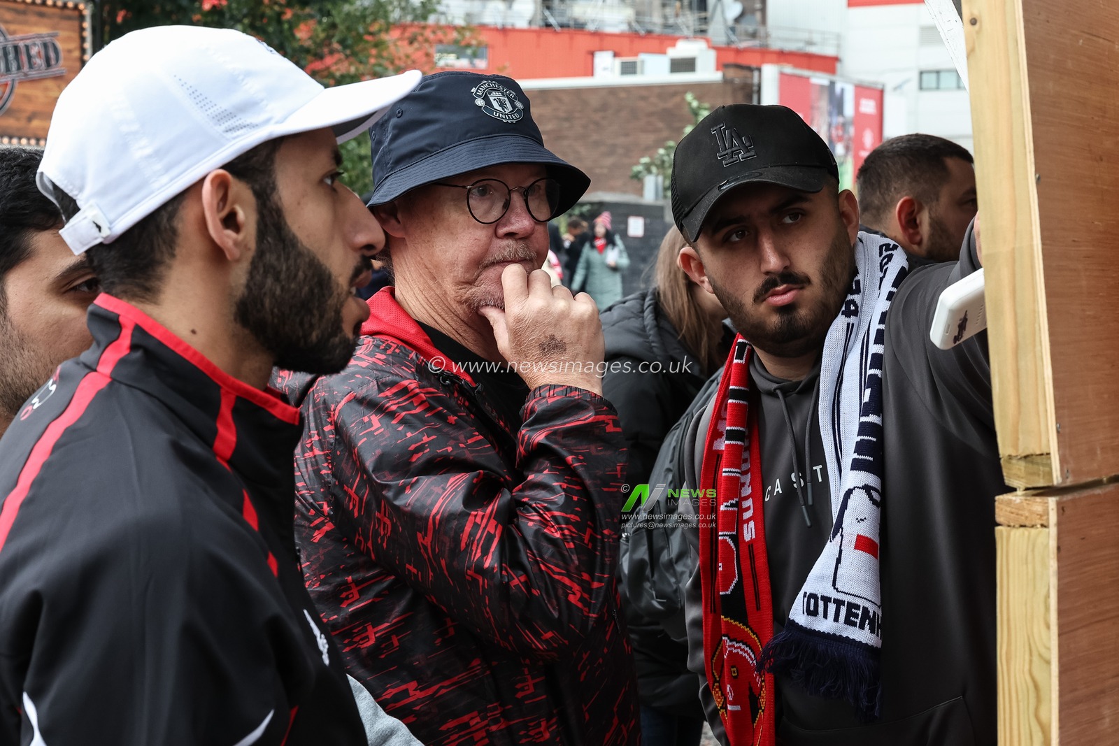 Fans brows pin badges during the Premier League match Manchester United vs Tottenham Hotspur at Old Trafford, Manchester, United Kingdom, 29th September 2024

(Photo by Mark Cosgrove/News Images)