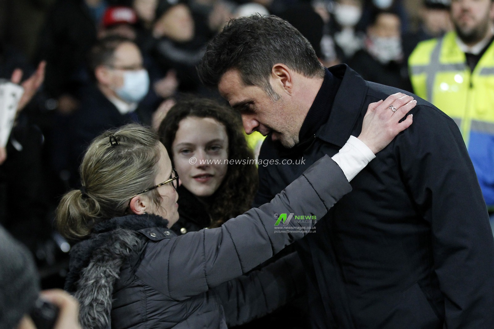 Marco Silva, manager of Fulham consoles the family of Paul Parrish who recently passed away at the last home match