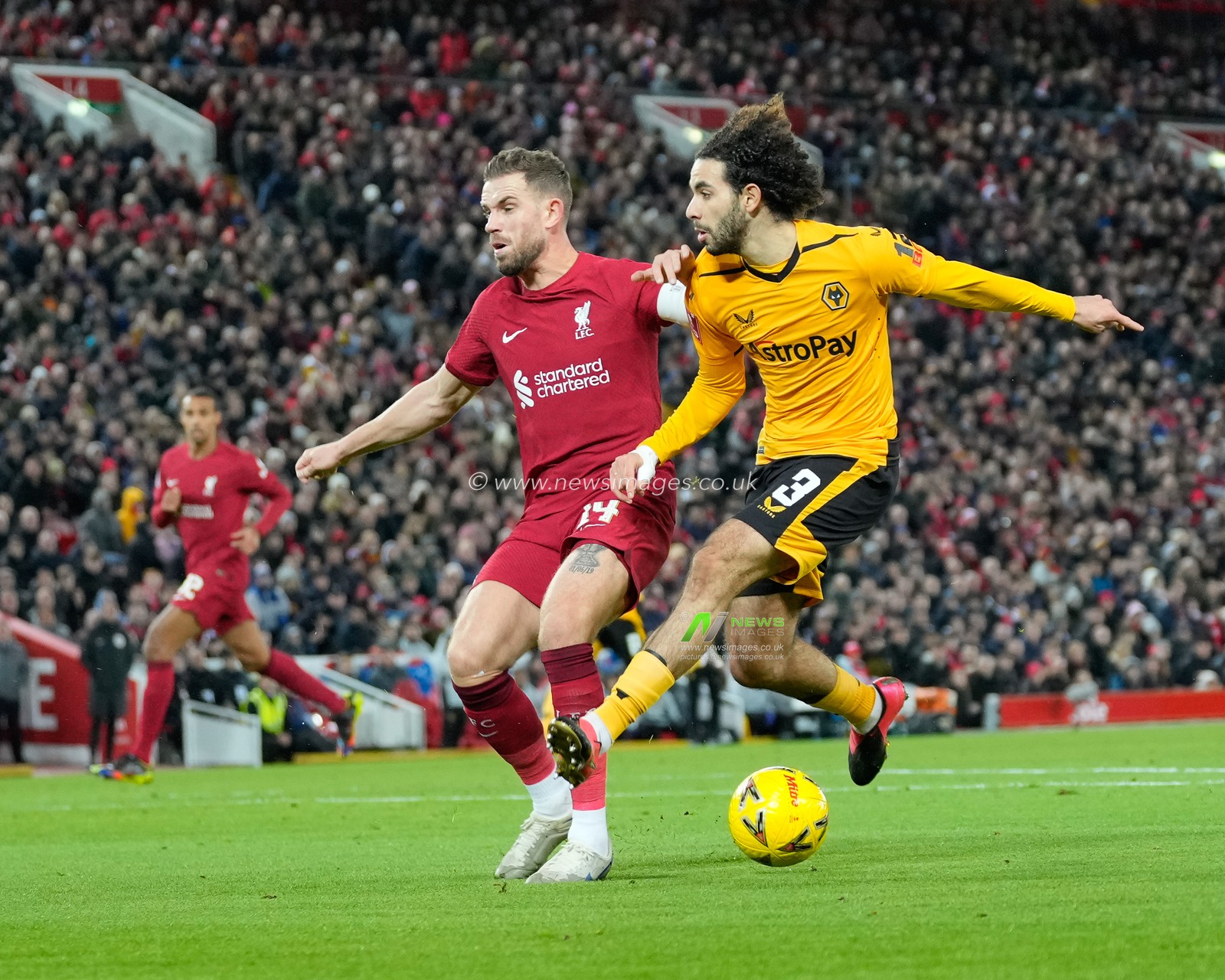Jordan Henderson #14 of Liverpool blocks a shot from Rayan AÃ¯t-Nouri #3 of Wolverhampton Wanderers during the Emirates FA Cup Third Round match Liverpool vs Wolverhampton Wanderers at Anfield, Liverpool, United Kingdom, 7th January 2023

(Photo by Steve Flynn/News Images)