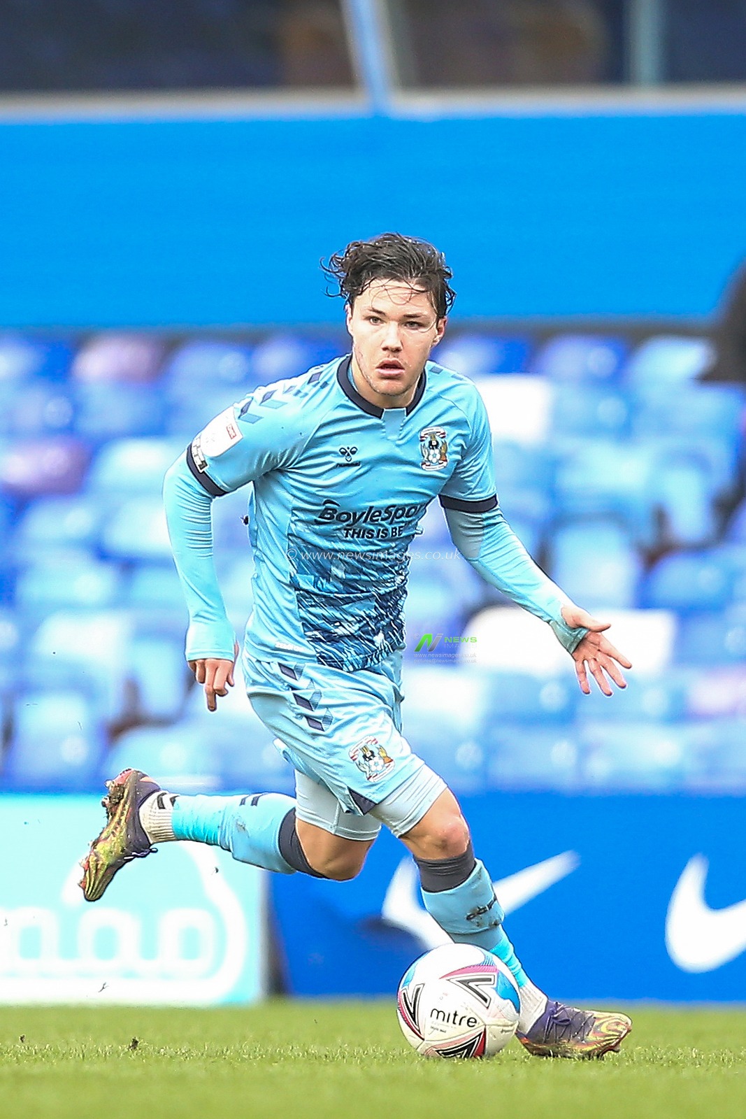 Callum OHare #11 of Coventry City dribbles the ball
