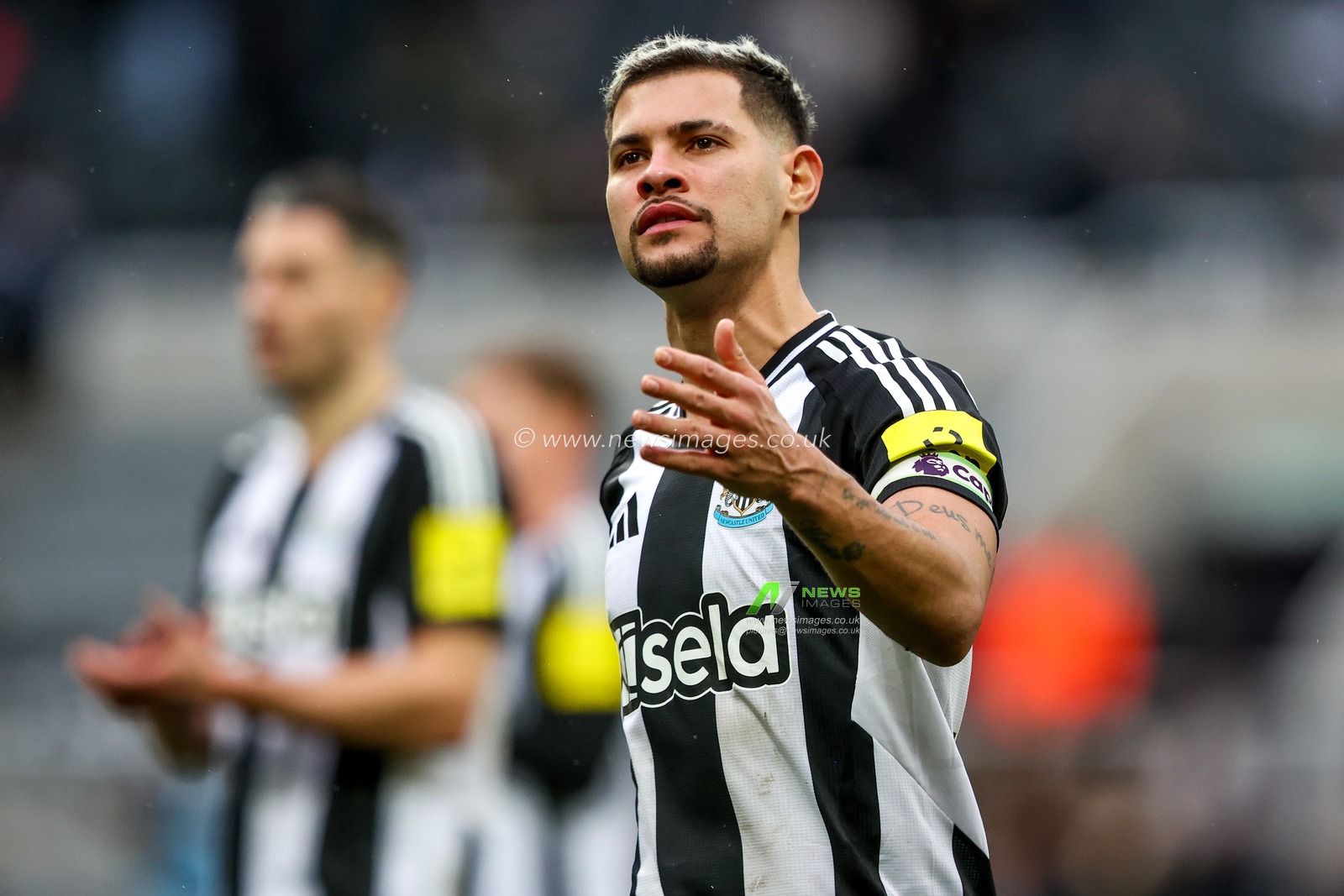Bruno Guimaraes of Newcastle United celebrates with fans after the teams victory following the Premier League match Newcastle United vs Nottingham Forest at St. James's Park, Newcastle, United Kingdom, 23rd February 2025

(Photo by Alfie Cosgrove/News Images)