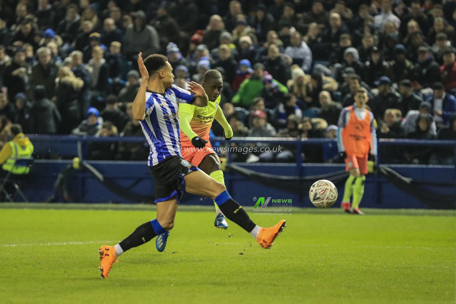 4th March 2020, Hillsborough, Sheffield, England; Emirates FA Cup FA Cup 5th Round, Sheffield Wednesday v Manchester City : Benjamin Mendy (22) of Manchester City shoots on goal causing Joe Wildsmith (28) of Sheffield Wednesday to make a full length save