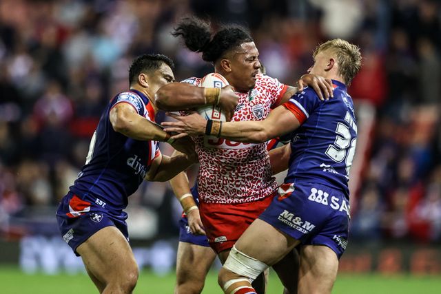 Tesi Niu of Leigh Leopards is tackled during the Betfred Super League play-off Eliminator 1 match Leigh Leopards vs Wakefield Trinity at Progress With Unity Stadium, Leigh, United Kingdom, 26th September 2025

(Photo by Alfie Cosgrove/News Images)