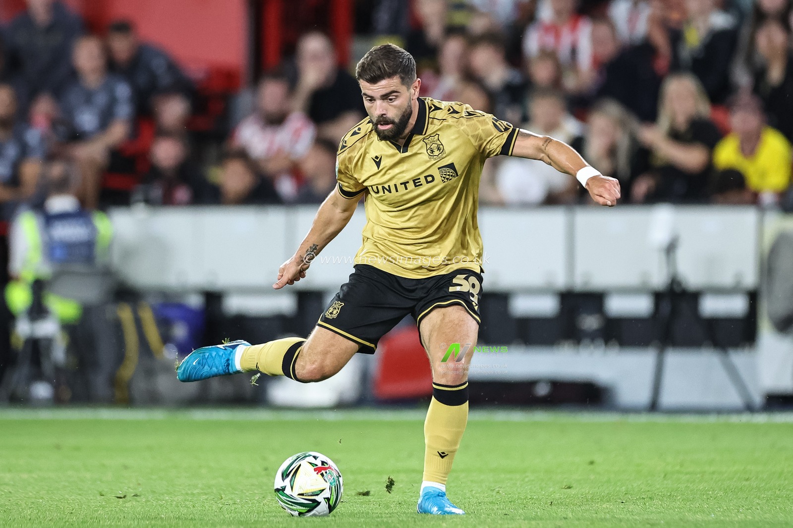 Elliot Lee of Wrexham in action during the Carabao Cup match Sheffield United vs Wrexham at Bramall Lane, Sheffield, United Kingdom, 13th August 2024

(Photo by Mark Cosgrove/News Images)