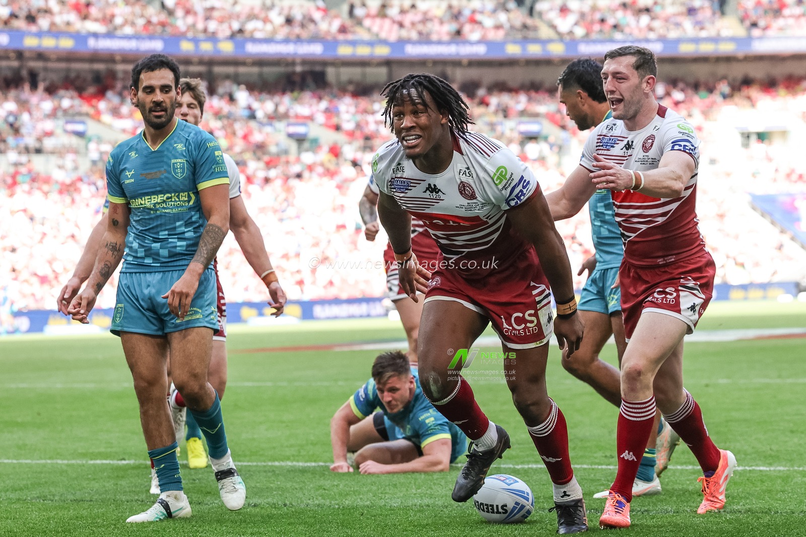 Junior Nsemba of Wigan Warriors celebrates his try during the Betfred Challenge Cup Final match Wigan Warriors vs Hull KR at Wembley Stadium, London, United Kingdom on 30 May 2026

(Photo by Mark Cosgrove/News Images)
