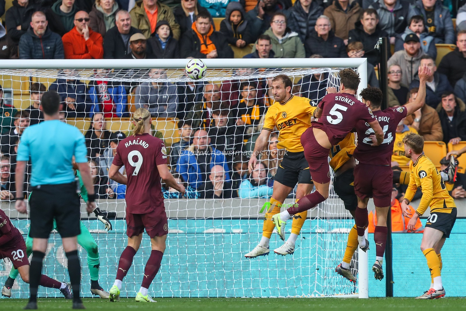 John Stones of Manchester City scores a goal to make it 1-2 during the Premier League match Wolverhampton Wanderers vs Manchester City at Molineux, Wolverhampton, United Kingdom, 20th October 2024

(Photo by Gareth Evans/News Images)