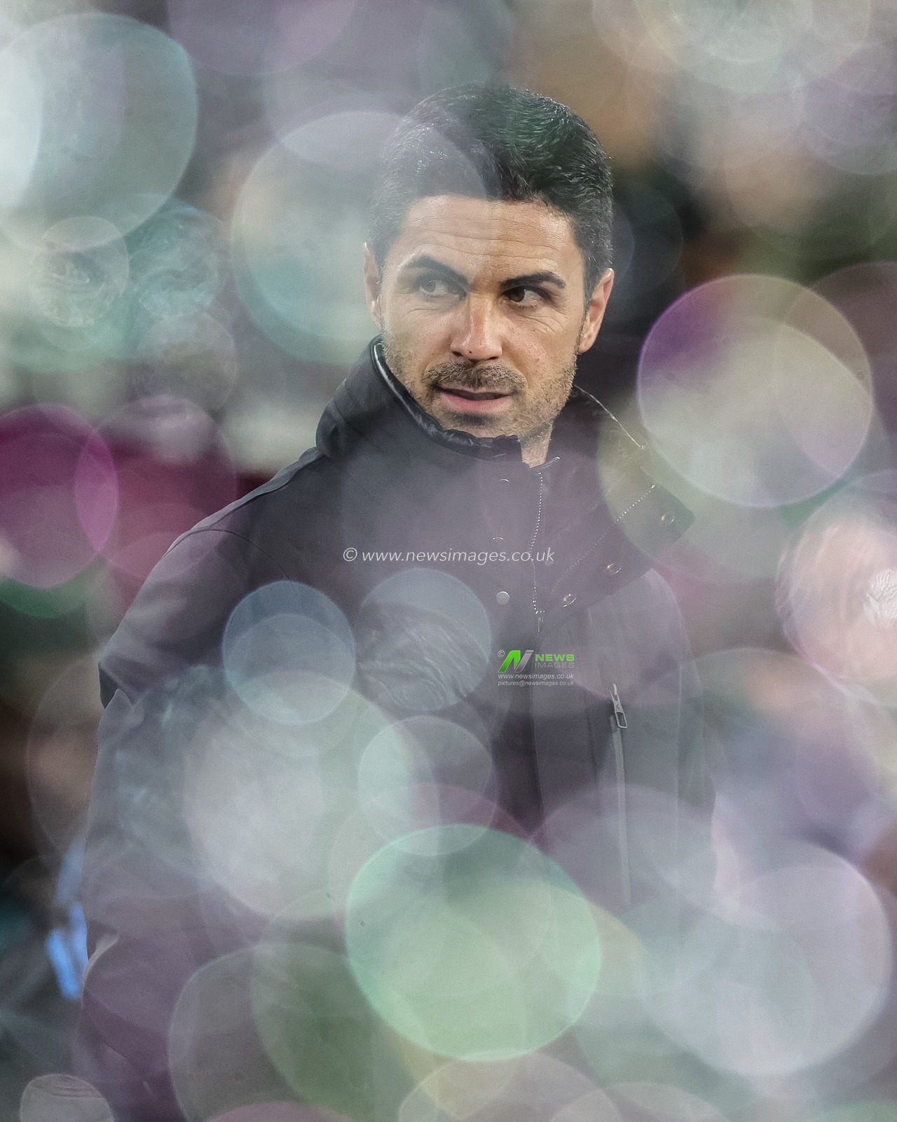 Mikel Arteta manager of Arsenal though the bubble of West Ham United during the Carabao Cup Fourth Round match West Ham United vs Arsenal at London Stadium, London, United Kingdom, 1st November 2023

(Photo by Mark Cosgrove/News Images)
