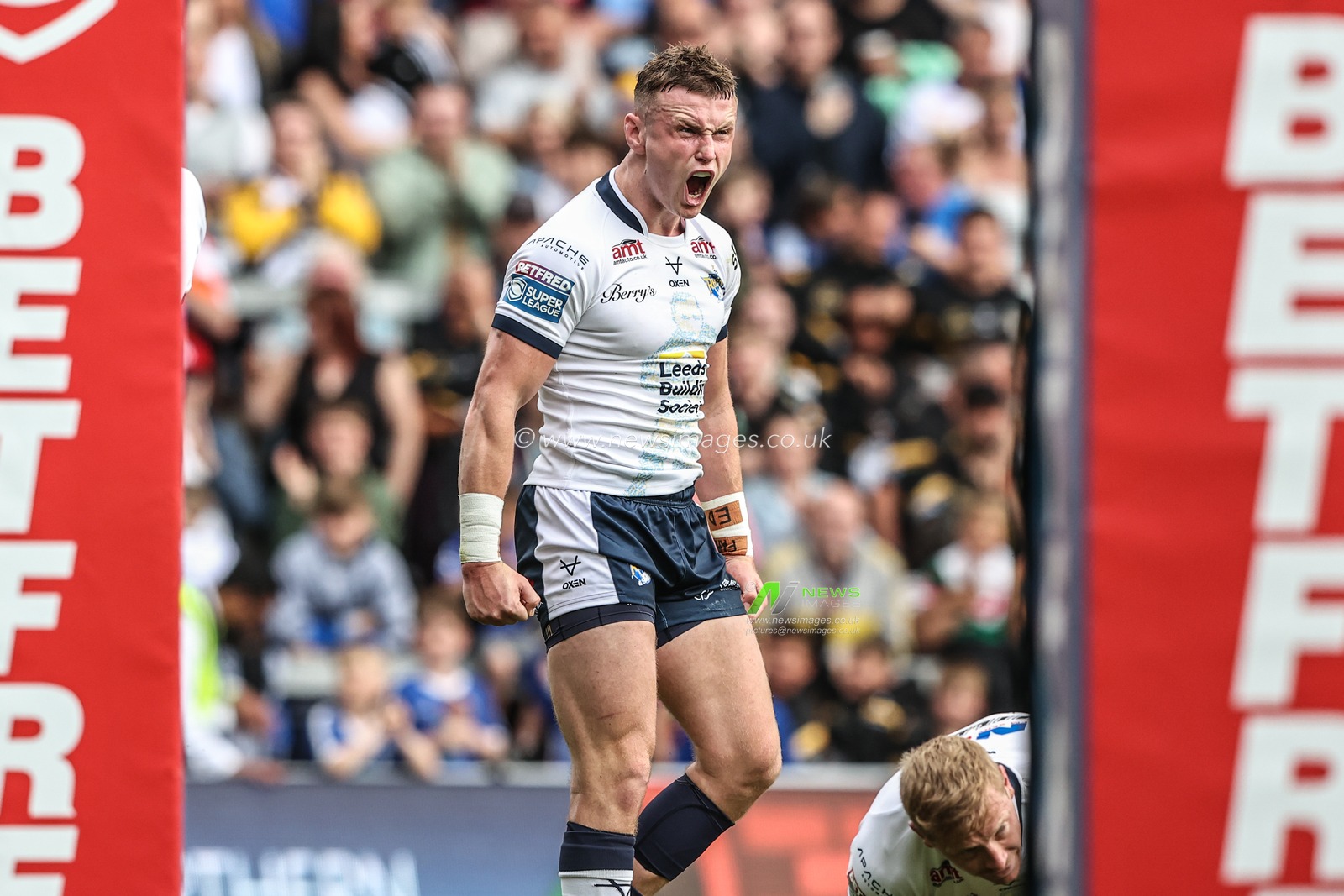 Harry Newman of Leeds Rhinos celebrates his try during the Betfred Super League Round 13 match Leeds Rhinos vs Wakefield Trinity at Headingley Stadium, Leeds, United Kingdom, 31st May 2025

(Photo by Alfie Cosgrove/News Images)