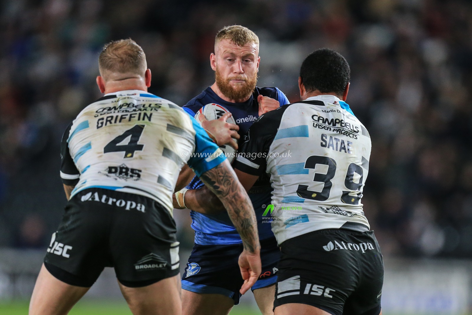 13th September 2019 , KCOM Stadium, Hull, England;  Betfred Super League Rugby, Round 29, Hull FC vs St Helens ; Luke Thompson (10) of St Helens runs at Josh Griffin (4) and Tevita Satae (39) of Hull FC 

Credit: David Greaves/News Images