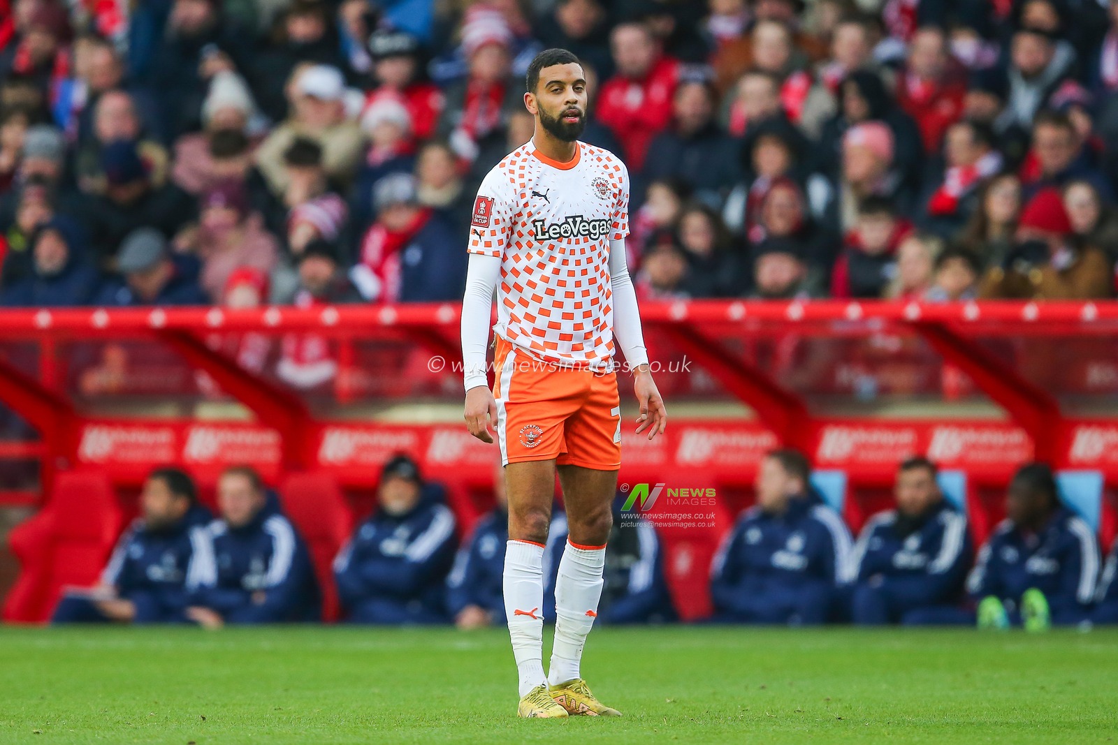 CJ Hamilton of Blackpool makes a break with the ball during the Emirates FA Cup Third Round match Nottingham Forest vs Blackpool at City Ground, Nottingham, United Kingdom, 7th January 2024

(Photo by Gareth Evans/News Images)