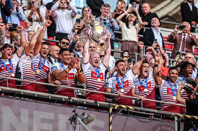 Liam Farrell of Wigan Warriors lifts the Betfred Challenge Cup Final Trophy during the Betfred Challenge Cup Final match Wigan Warriors vs Hull KR at Wembley Stadium, London, United Kingdom on 30 May 2026

(Photo by Alfie Cosgrove/News Images)
