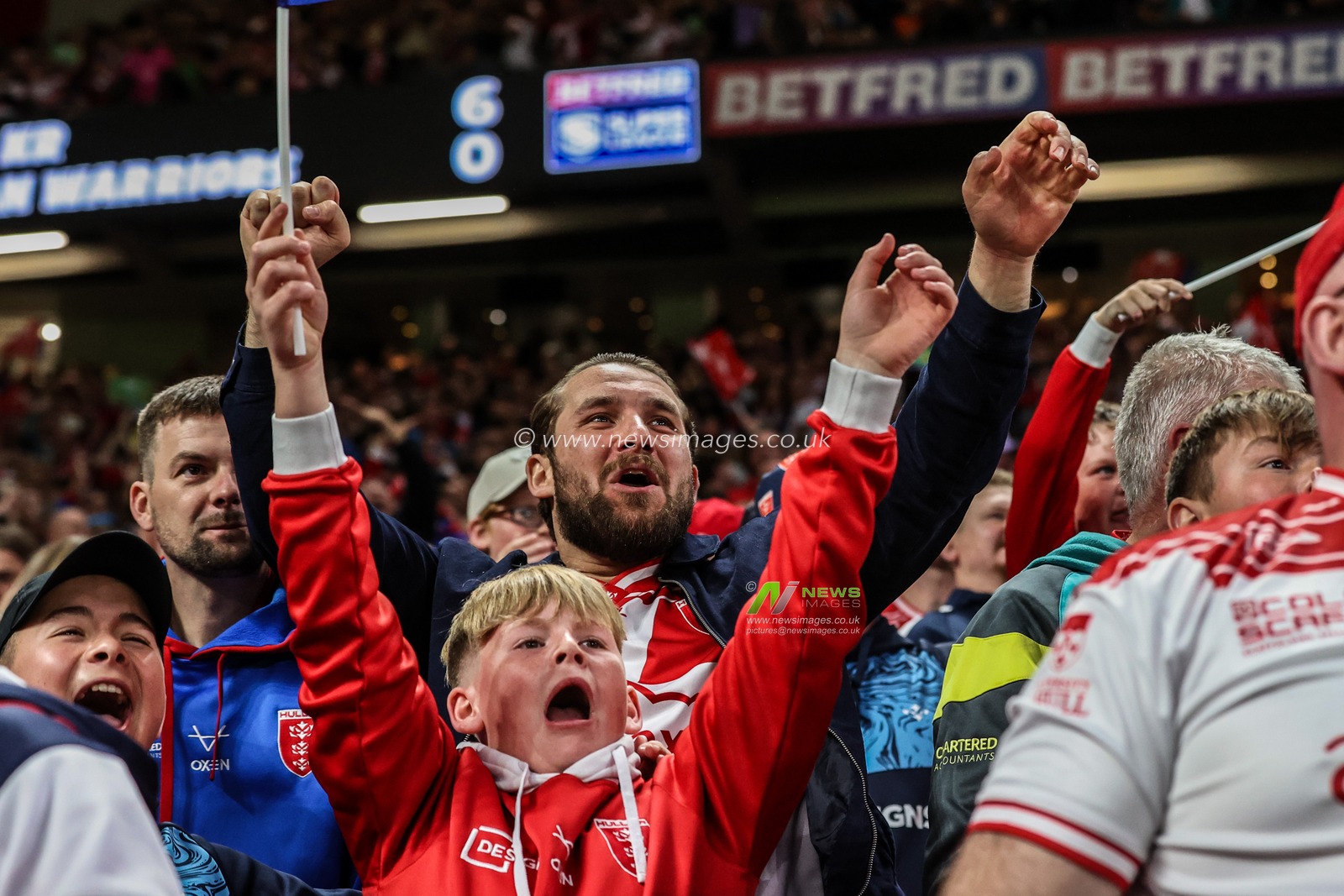Hull KR fans celebrate a try from Joe Burgess of Hull KR making it 10-0 during the 2025 Betfred Super League Grand Final Hull KR v Wigan Warriors at Old Trafford, Manchester, United Kingdom, 11th October 2025

(Photo by Alfie Cosgrove/News Images)