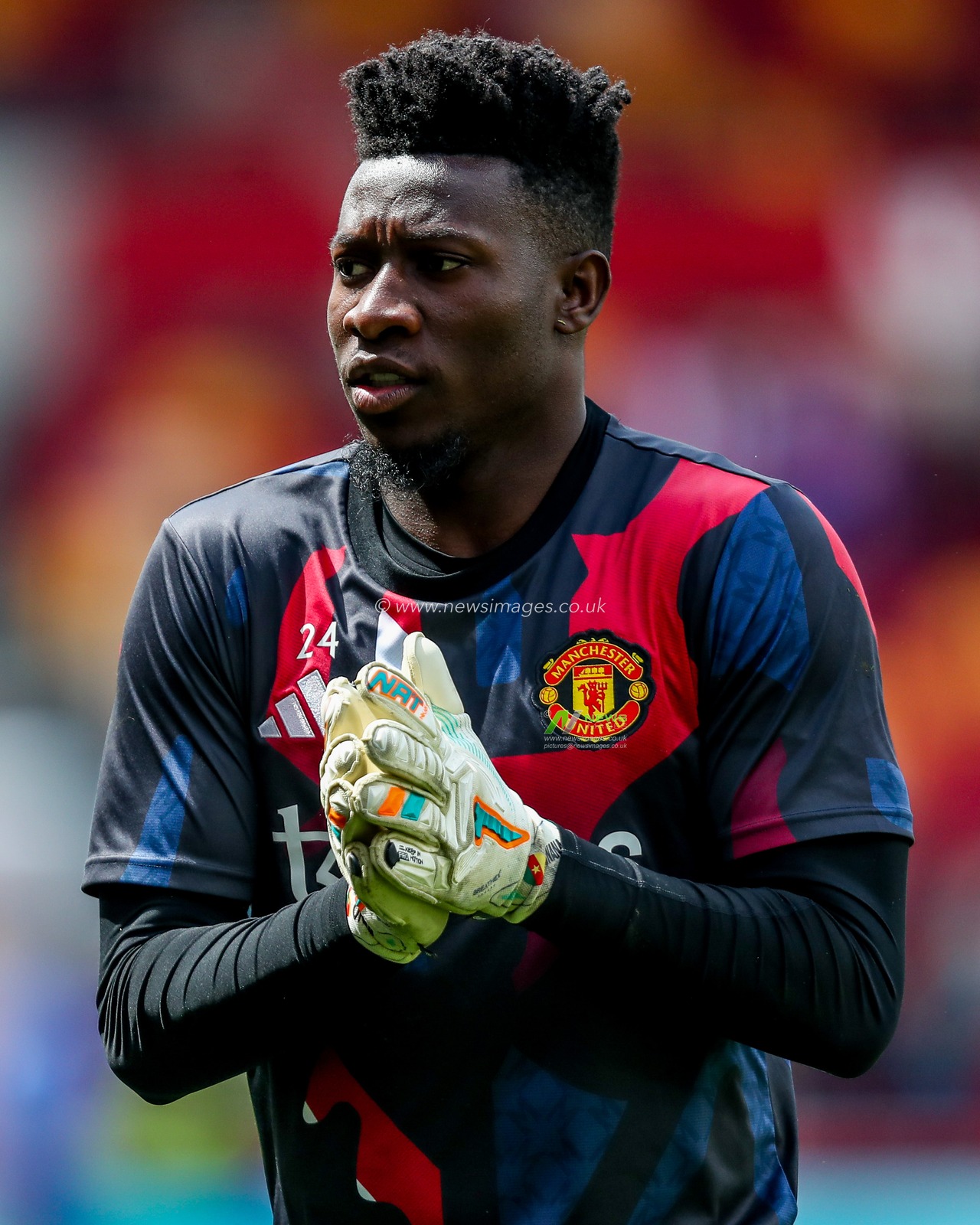 Andre Onana of Manchester United warms up prior to the Premier League match Brentford vs Manchester United at The Gtech Community Stadium, London, United Kingdom, 4th May 2025

(Photo by Izzy Poles/News Images)