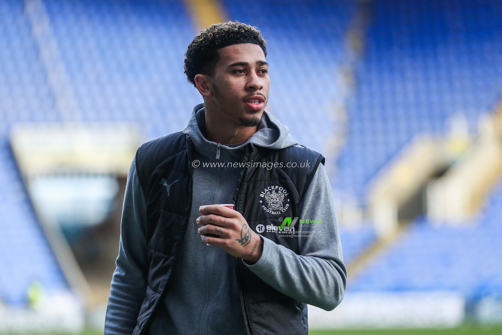 Jordan Lawrence-Gabriel of Blackpool arrives at the Select Car Leasing Stadium prior to during the Sky Bet League 1 match Reading vs Blackpool at Select Car Leasing Stadium, Reading, United Kingdom, 14th December 2024

(Photo by Izzy Poles/News Images)